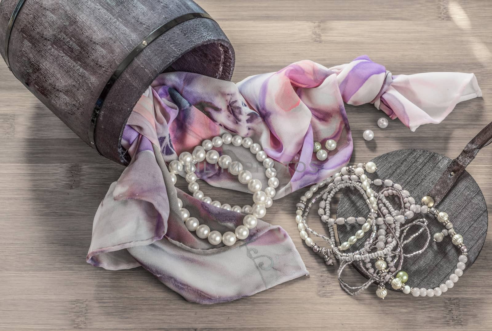 Still life details, scarf and pearls in retro vintage wooden box