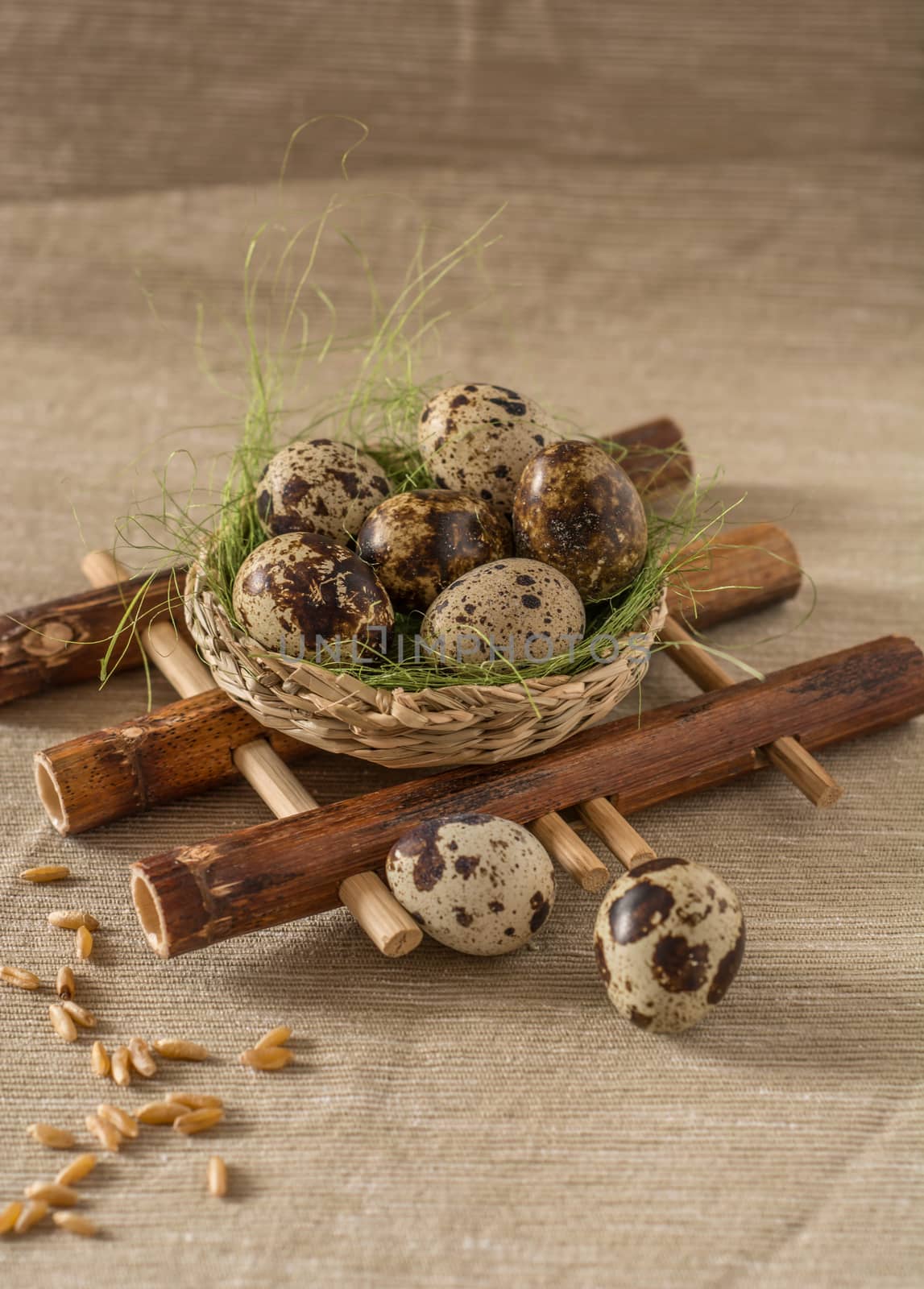 Quail eggs on bamboo pad