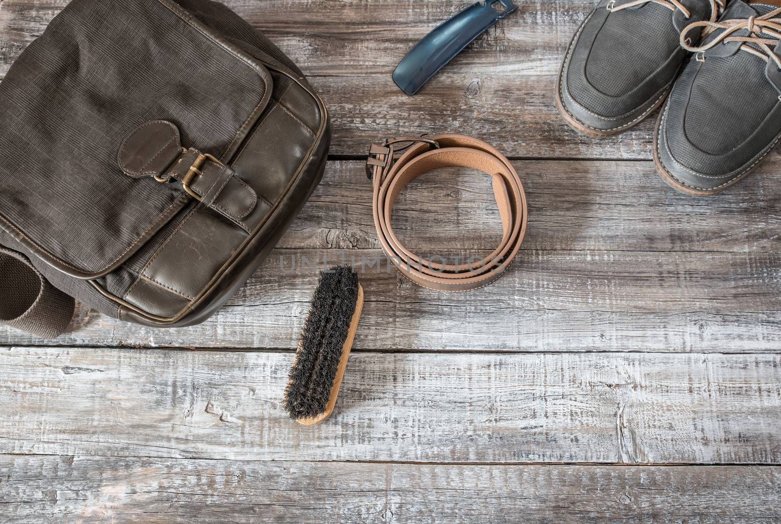 Vintage still life of random objects of men on wooden board