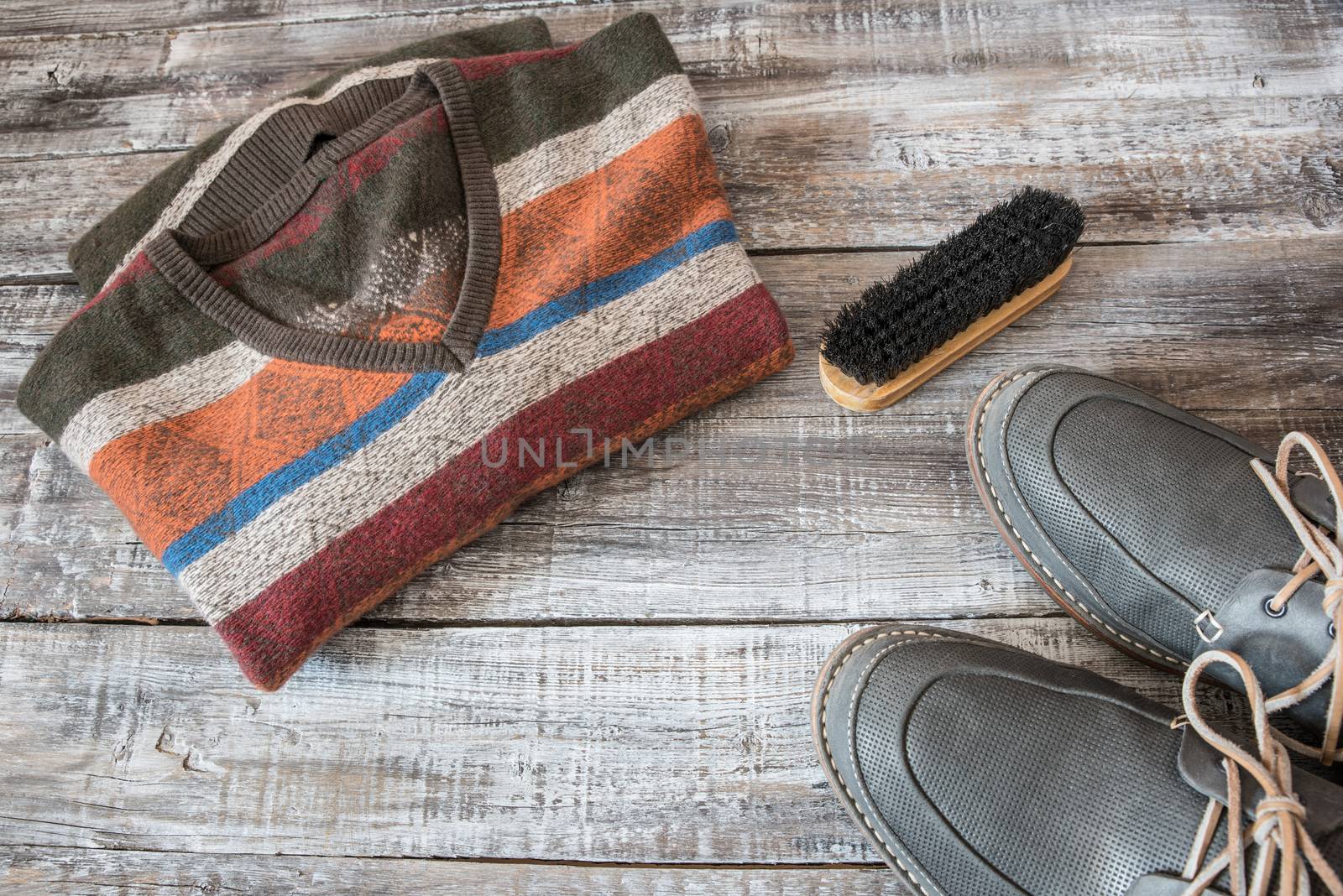 Travel, vacation concept of random men objects on wooden background