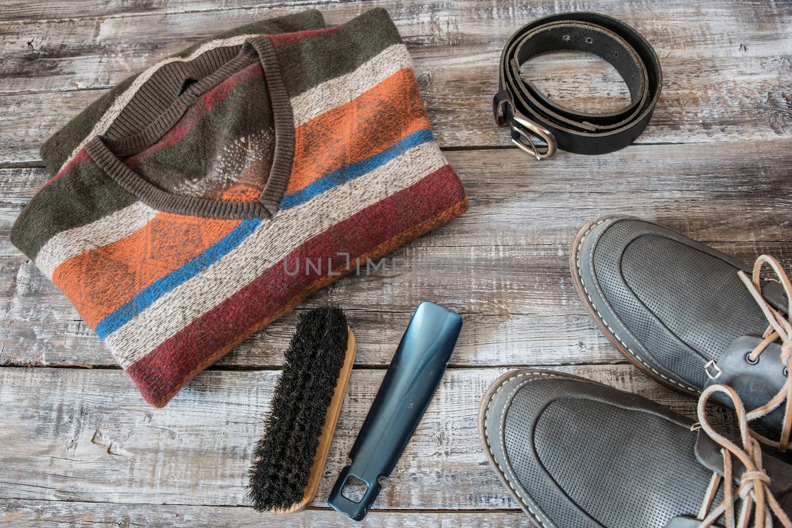 Travel, vacation concept of random men's objects on wooden background