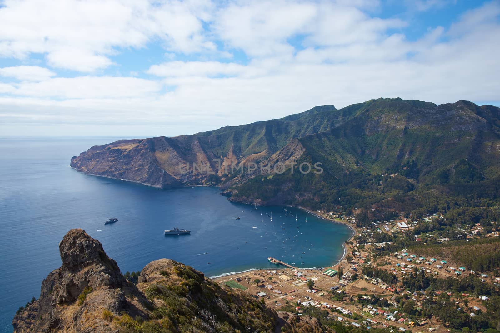 Panoramic view of Cumberland Bay and the town of San Juan Bautista on Robinson Crusoe Island, one of three main islands making up the Juan Fernandez Islands some 400 miles off the coast of Chile.