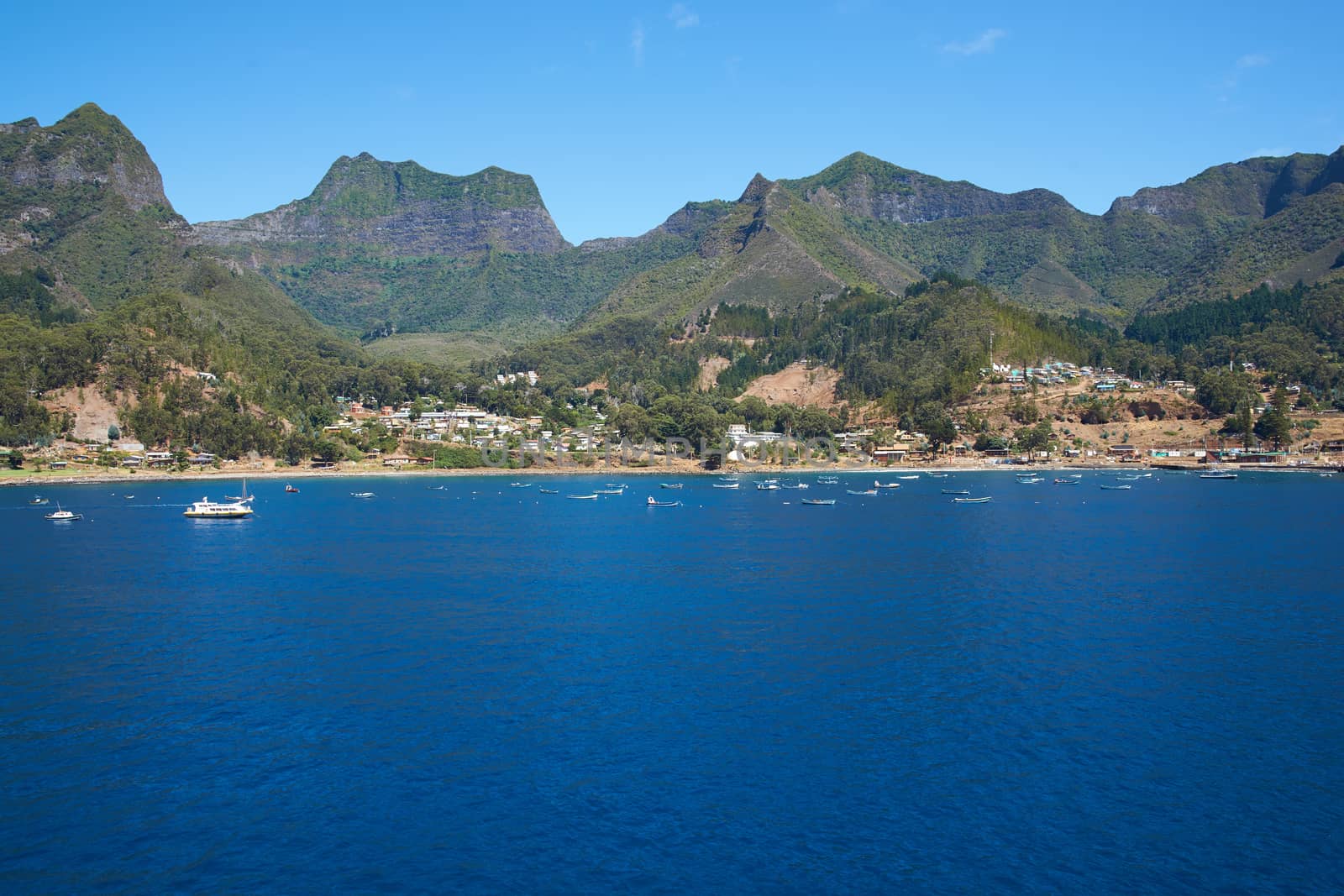 Panoramic view of Cumberland Bay looking towards the small town of San Juan Bautista on Robinson Crusoe Island, one of three main islands making up the Juan Fernandez Islands some 400 miles off the coast of Chile.