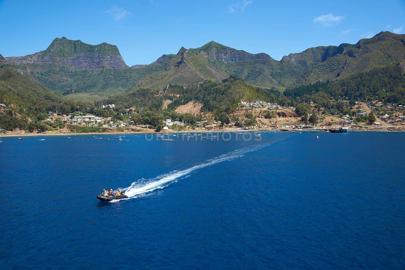 Panoramic view of Cumberland Bay looking towards the small town of San Juan Bautista on Robinson Crusoe Island, one of three main islands making up the Juan Fernandez Islands some 400 miles off the coast of Chile.