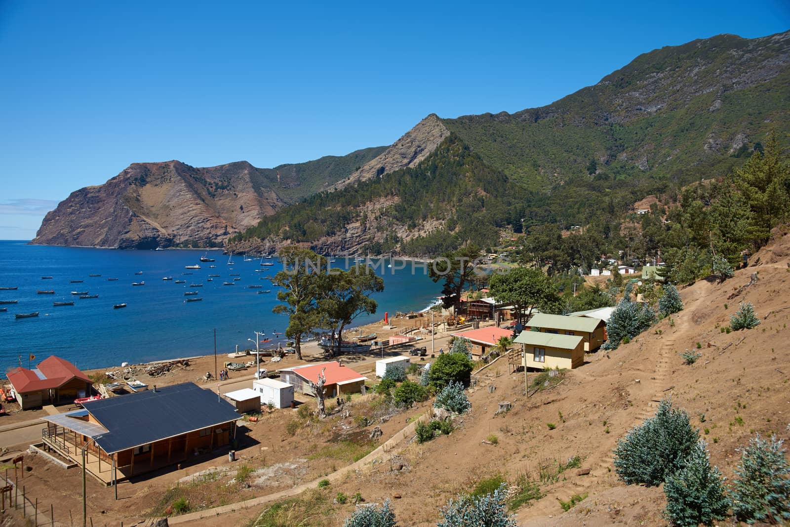Cumberland Bay and the town of San Juan Bautista on Robinson Crusoe Island, one of three main islands making up the Juan Fernandez Islands some 400 miles off the coast of Chile.