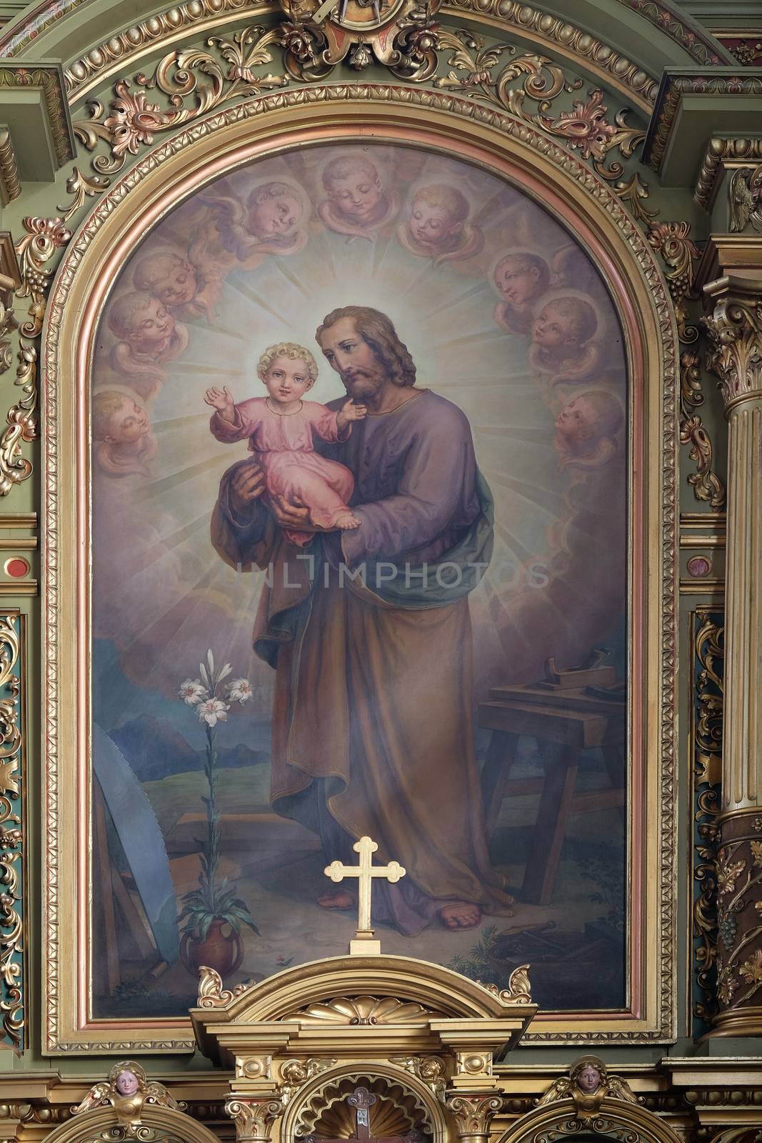 Saint Joseph holding child Jesus altarpiece in the Basilica of the Sacred Heart of Jesus in Zagreb, Croatia
