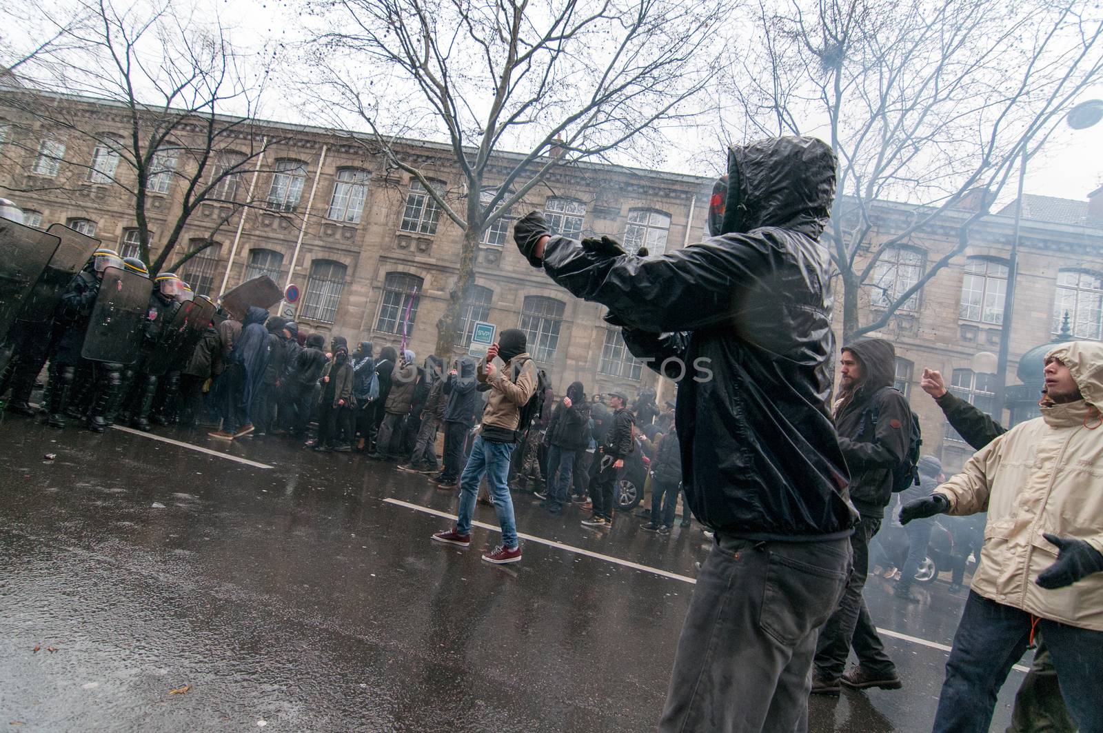 FRANCE, Marseille: Protesters face police during a demonstration against the French government's planned labour law reforms on March 31, 2016 in Paris. France faced fresh protests over labour reforms just a day after the beleaguered government of President Francois Hollande was forced into an embarrassing U-turn over constitutional changes.