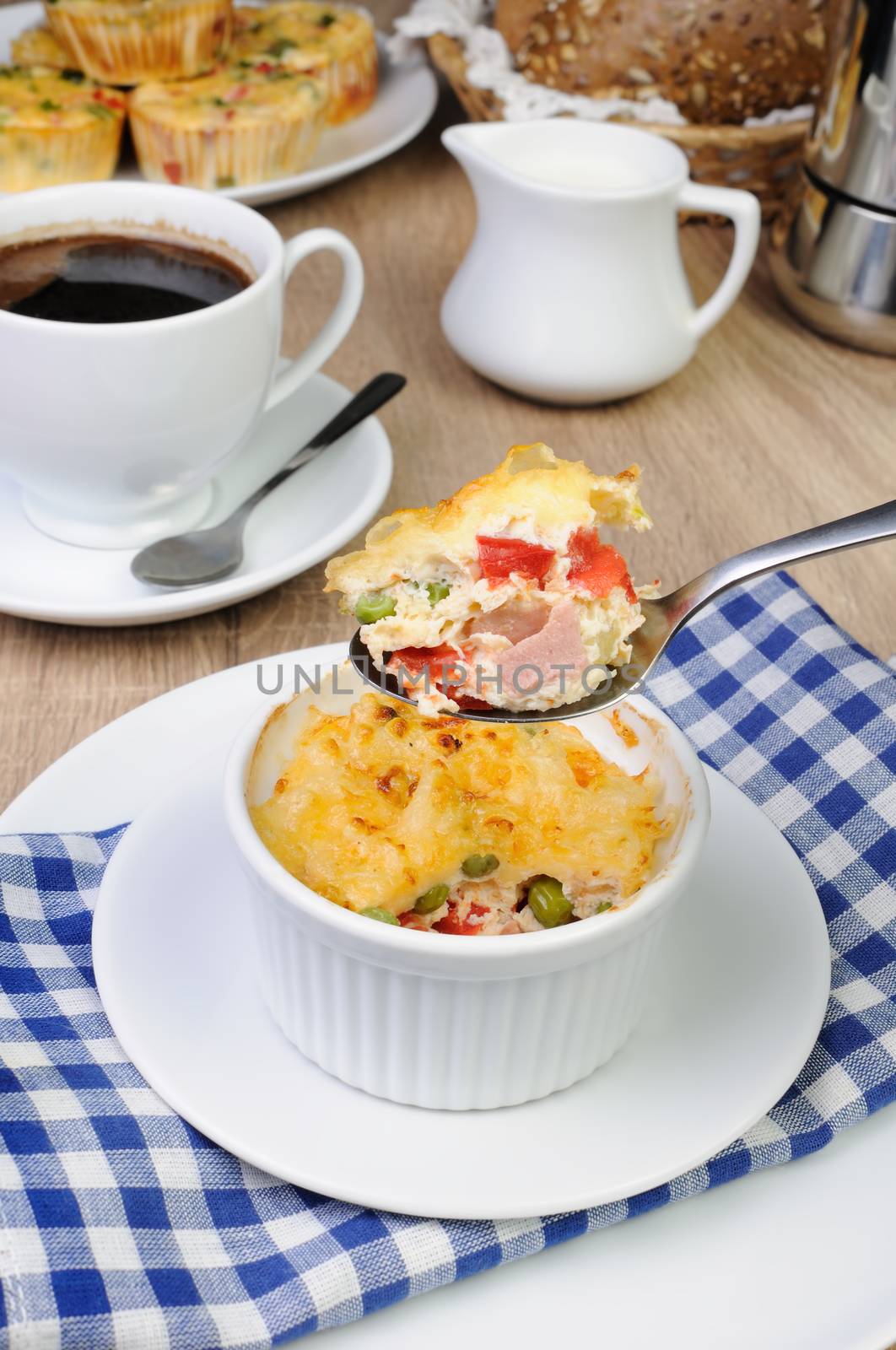 Baked vegetable casserole portion ham with cheese