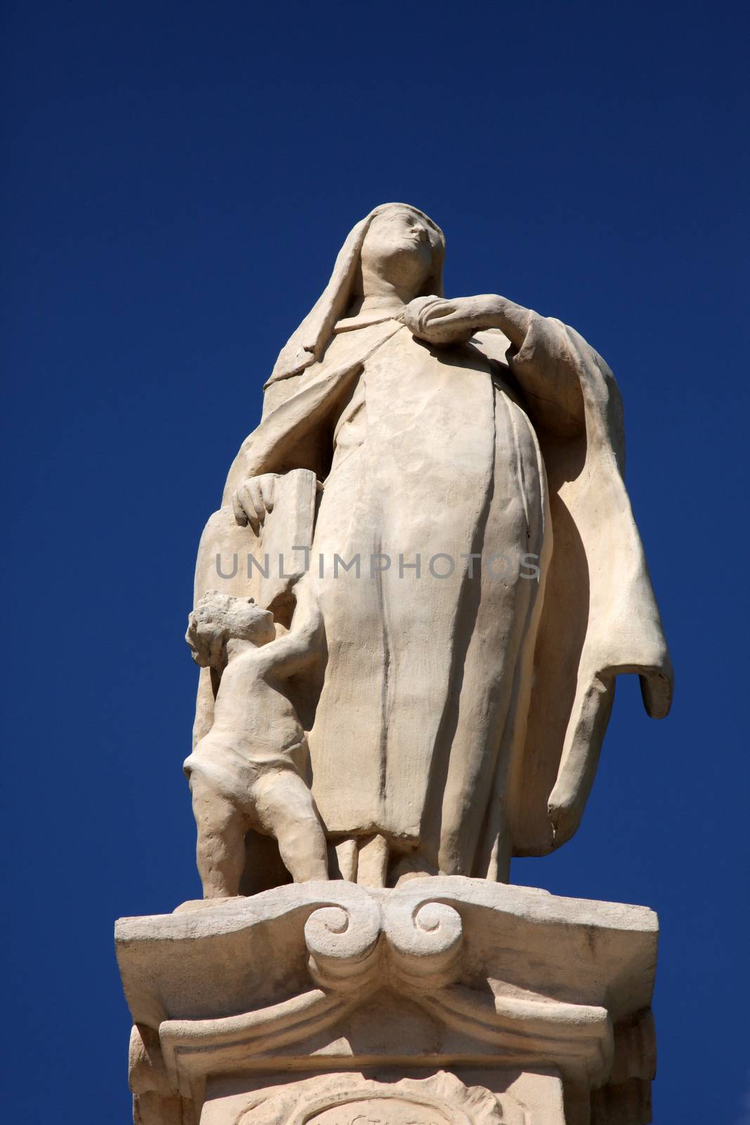 Saint Teresa of Avila statue in front of the Cathedral of St. Teresa of Avila in Bjelovar, Croatia