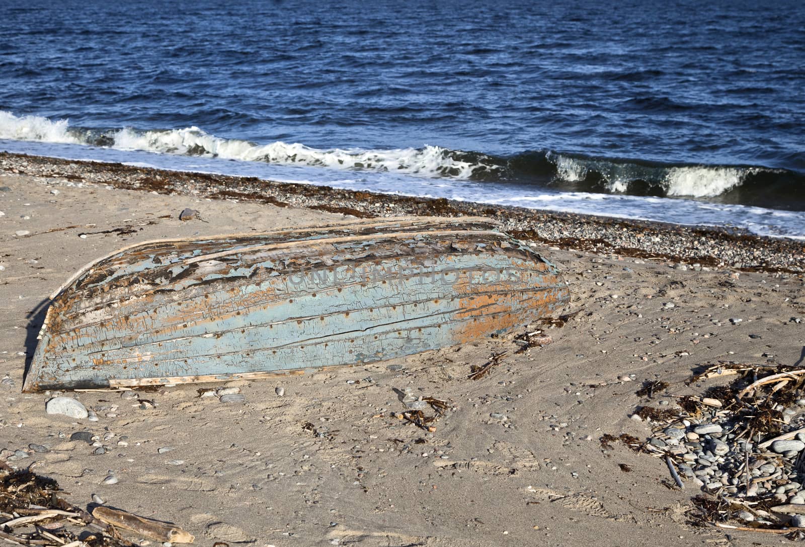 Old abandoned boat on a shore of White sea