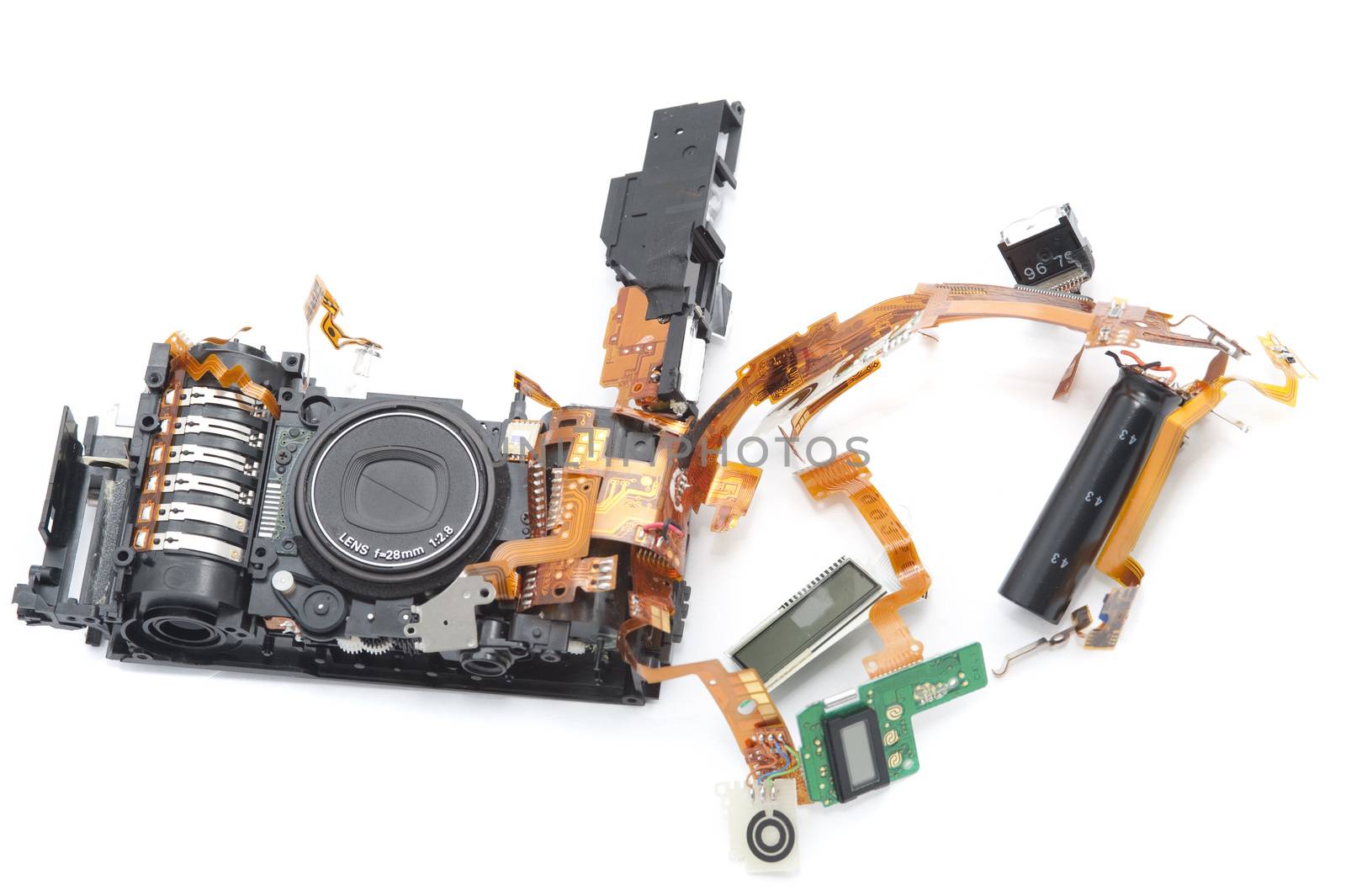 Disassembled digital camera with exposed lens by stockarch