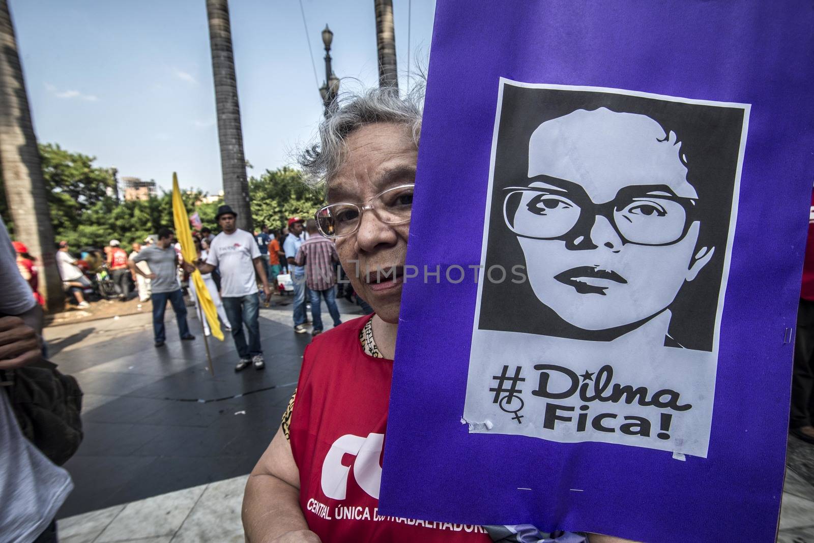 BRAZIL, Sao Paulo: A protester holds a banner with the effigy of President Dilma Rousseff as hundreds protest in support of Brazil's President Dilma Rousseff and former President Luiz Inacio Lula da Silva at the Se Square, in Sao Paulo, southeastern Brazil, on March 31, 2016. Rousseff is currently facing impeachment proceedings as her government faces a stalling national economy and multiple corruption scandals. 