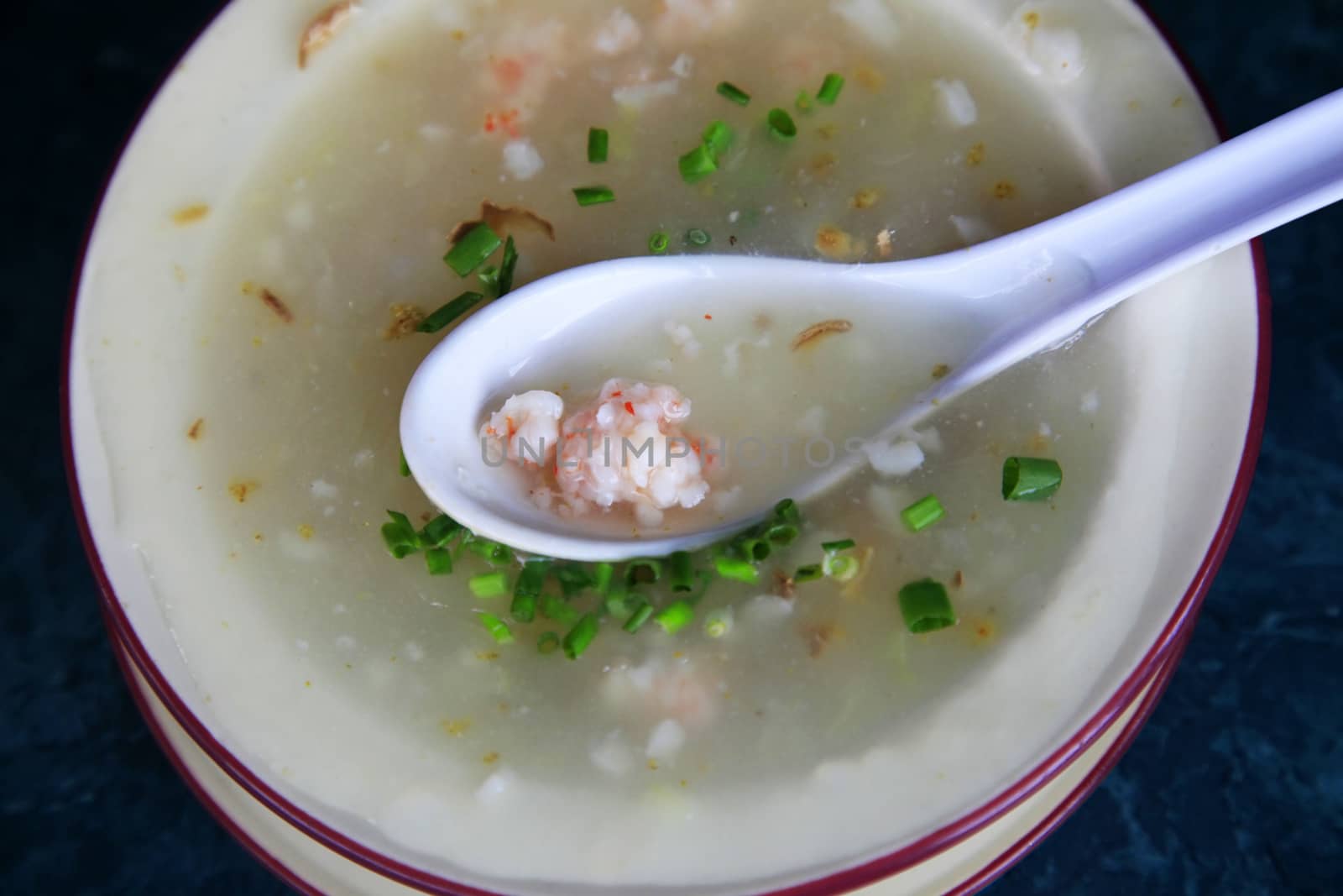 Fish cream soup on a dark blue background