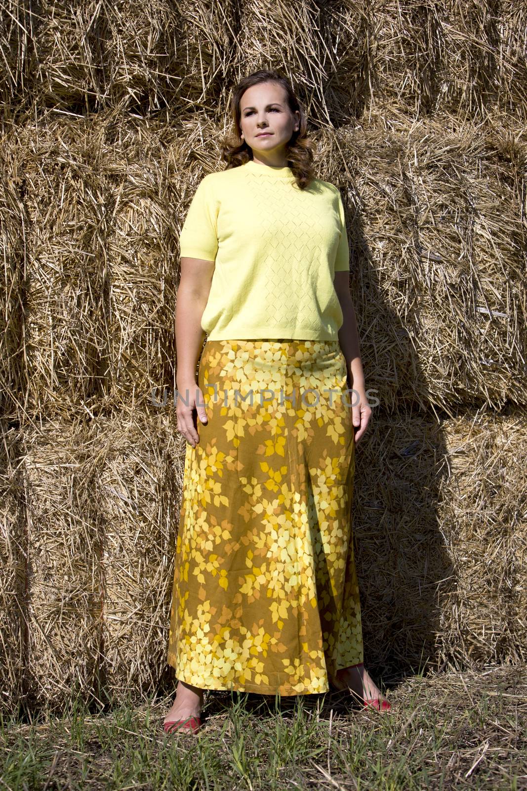 woman wearing yellow fall outfit by zdenkadarula