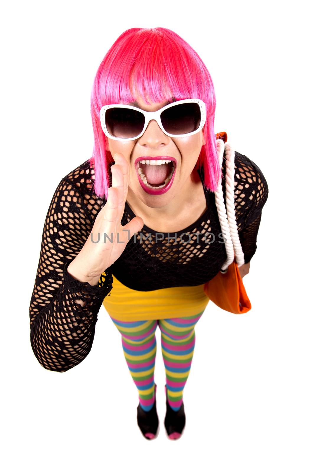 woman with pink hair wearing colorful stylish outfit