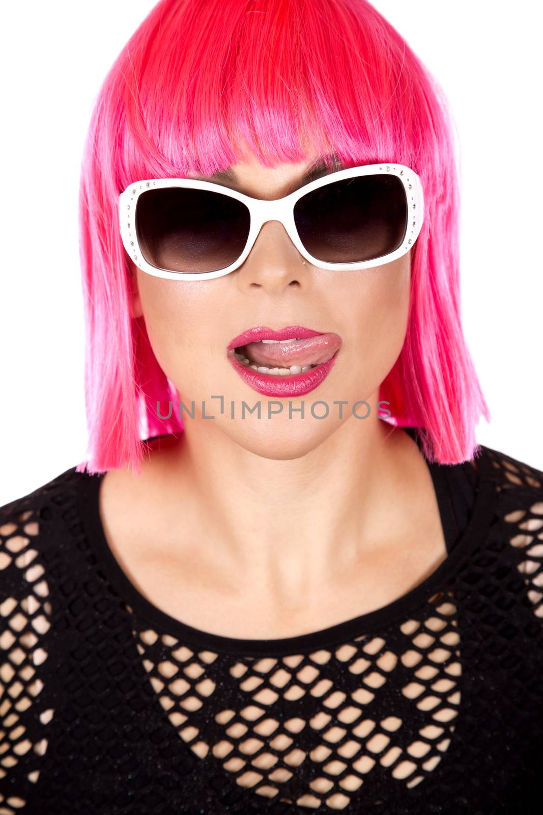 woman with pink hair wearing colorful stylish outfit