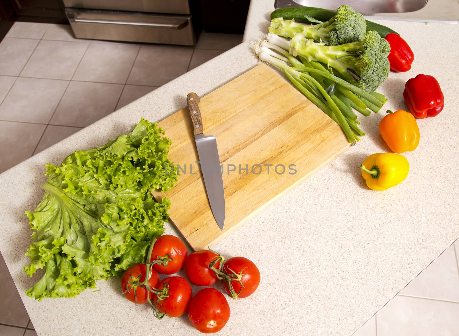 raw vegetables sitting on the kitchen table