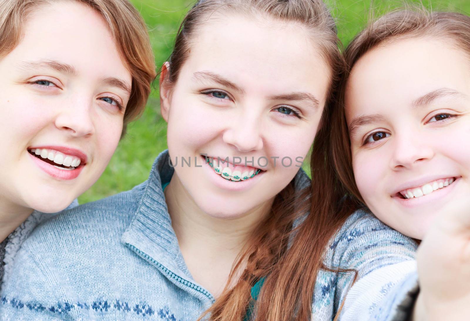 Three Cute Girls Taking a Selfie together