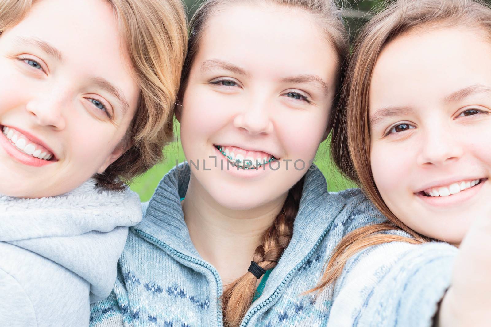 Three Cute Girls Taking a Selfie together
