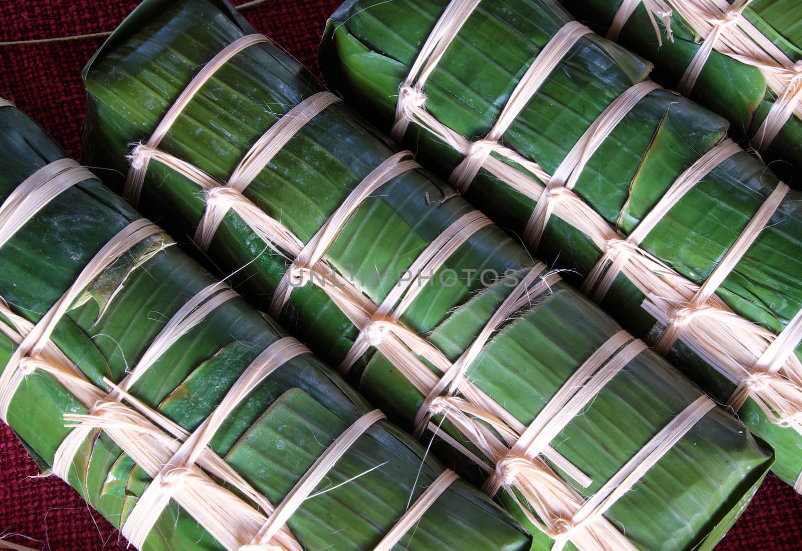 Vietnamese food, traditional food on tet holiday in spring, banh tet also name Cylindric glutinous rice cake, make from sticky rice, mung been, cover by banana leaf, tradition eating on lunar new year