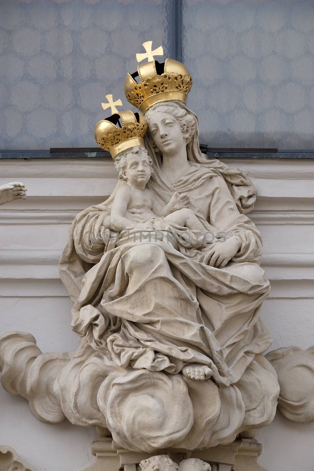 Virgin Mary with baby Jesus on the portal of Mariahilf church in Graz, Styria, Austria