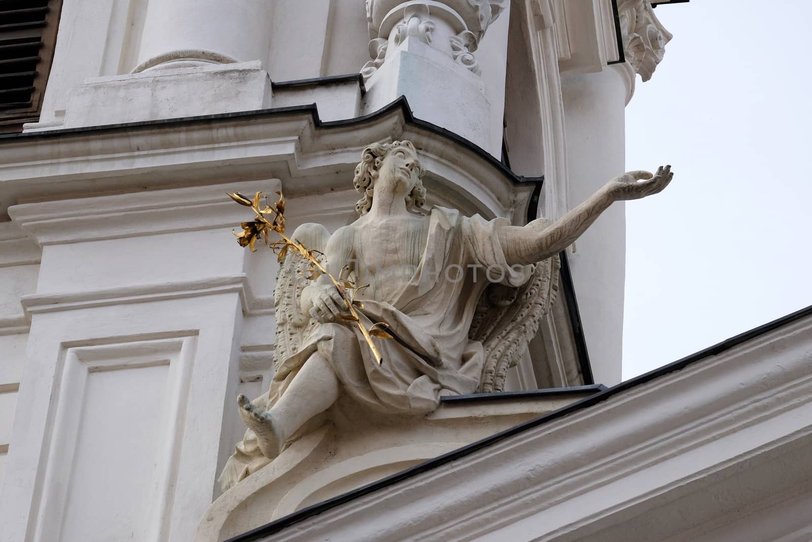 Angel on the portal of Mariahilf church in Graz, Styria, Austria