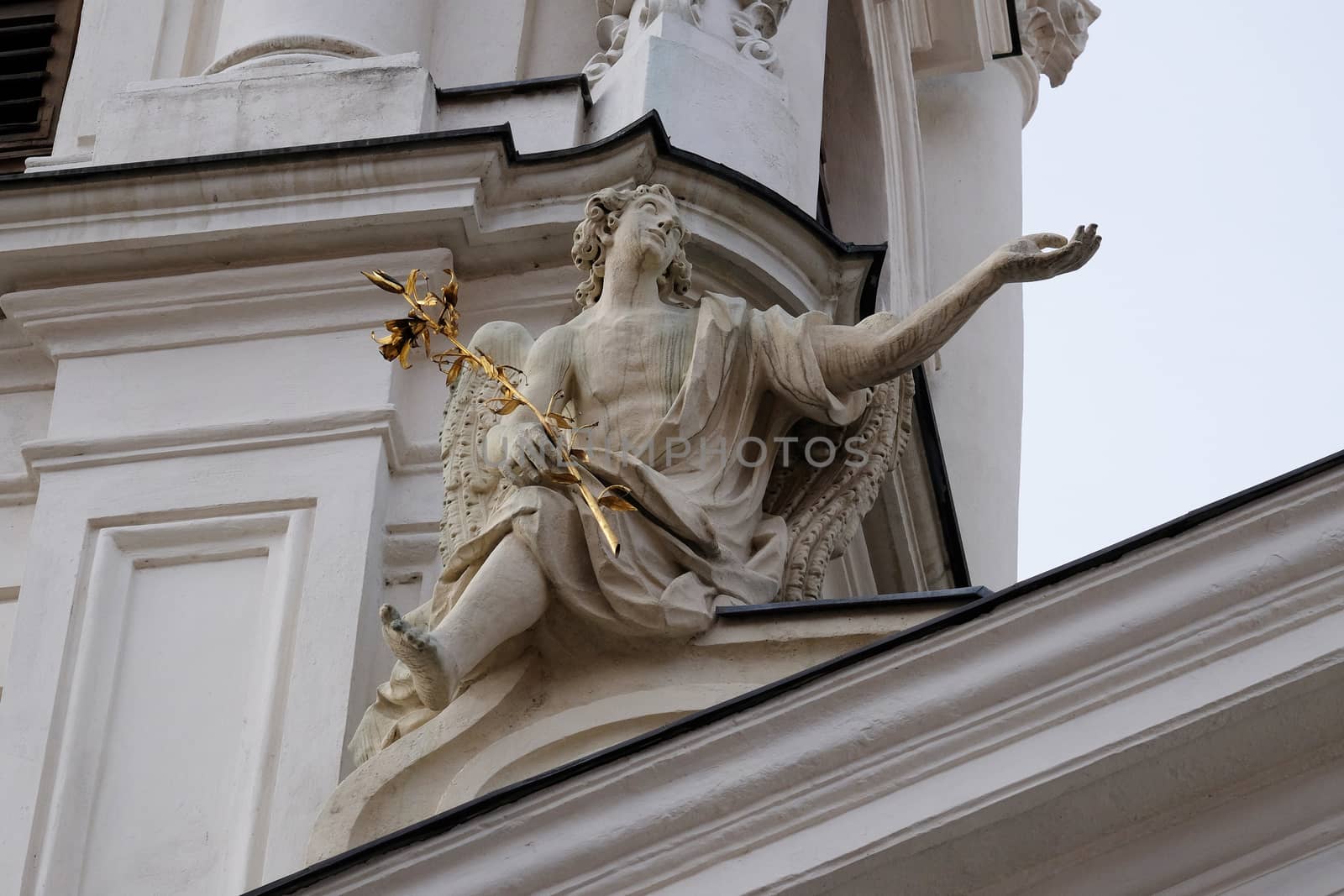 Angel on the portal of Mariahilf church in Graz, Styria, Austria