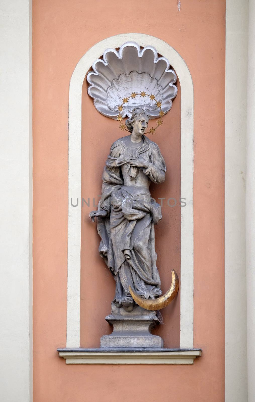 Virgin Mary on the portal of Dreifaltigkeitskirche ( Holy Trinity ) church in Graz, Styria, Austria