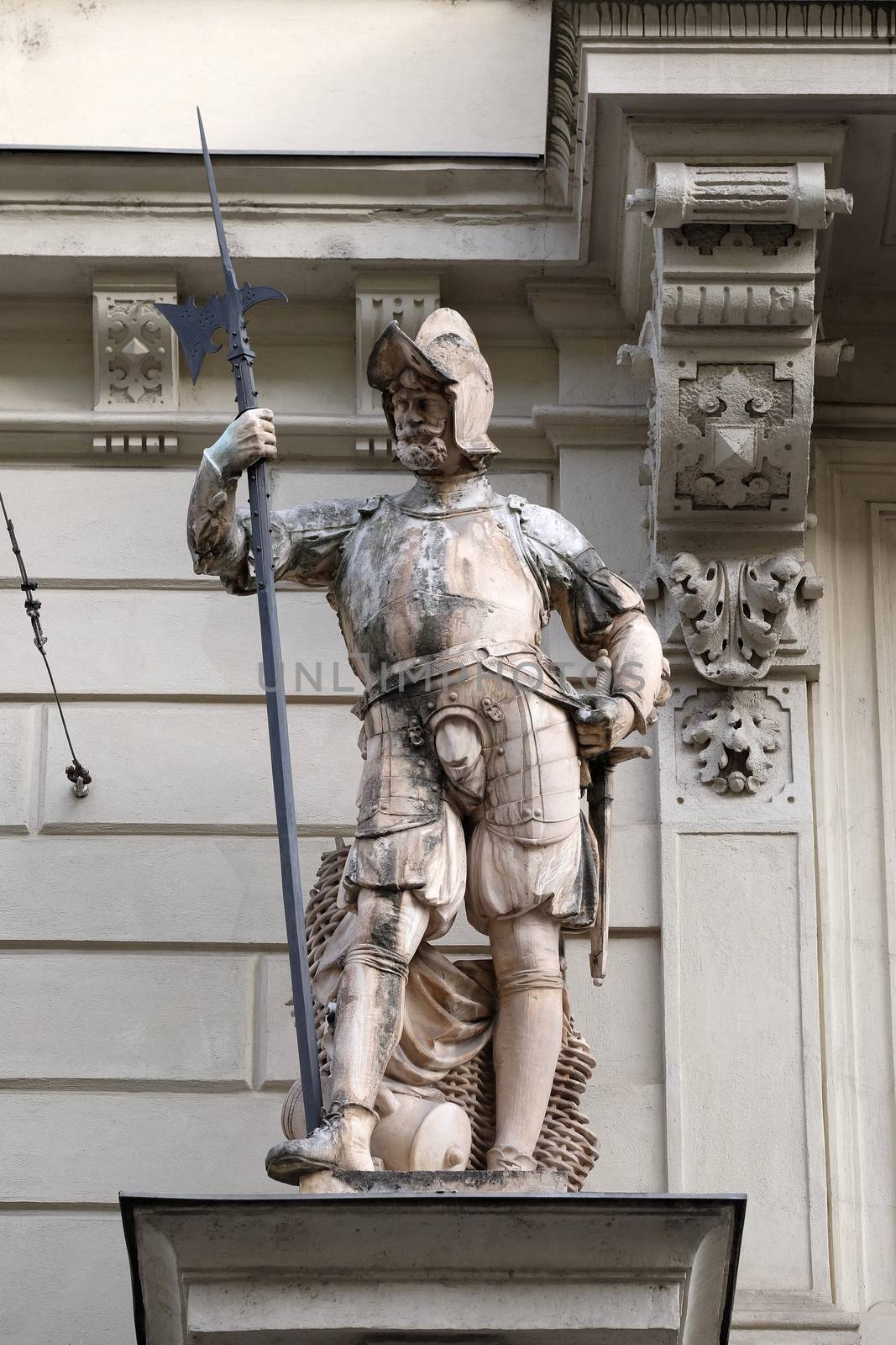 Statue of Austrian soldiers on the portal of City Hall. Graz is the capital city of Styria, Austria