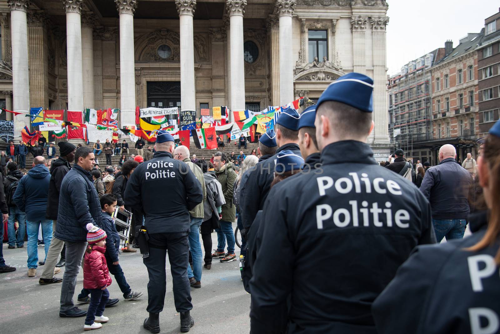 BELGIUM, Brussels: Police officers intervene at the Beurs-La Bourse square, in Bruxelles, in order to arrest antiracist activists who have tried to demonstrate even though any demonstration has been banned by Belgian authorities, on April 2, 2016.