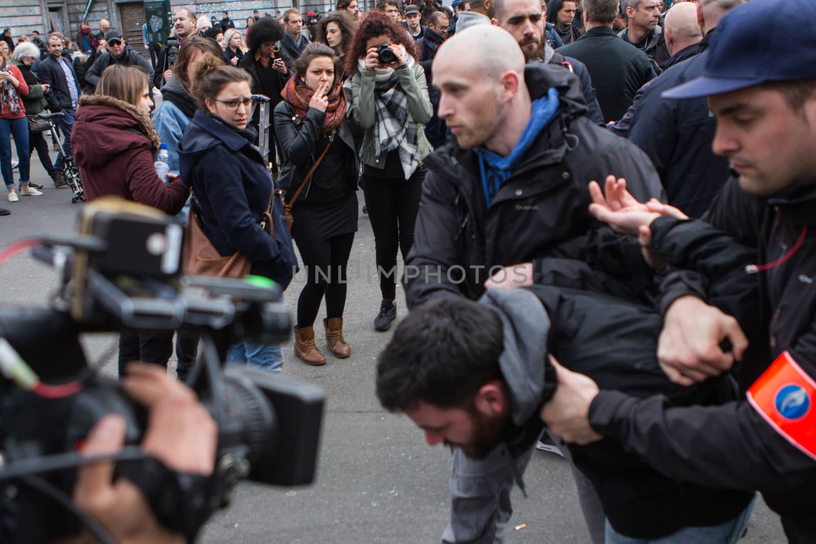 BELGIUM, Brussels: Police arrest at least ten people during a demonstration against racism at Bourse square on April 2, 2016, central Brussels, according to Belgian newspaper Le Soir. Belgian authorities ban any gathering on the same day. A week before, riot police fired water cannon at far-right football hooligans who invaded the same square in the Belgian capital that has become a memorial to the victims of the Brussels attacks. 