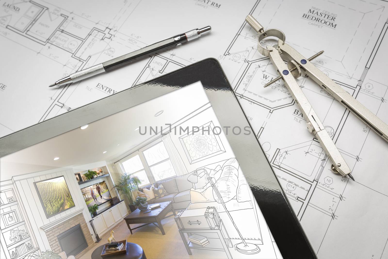 Computer Tablet Showing Living Room Illustration Sitting On House Plans With Pencil and Compass.