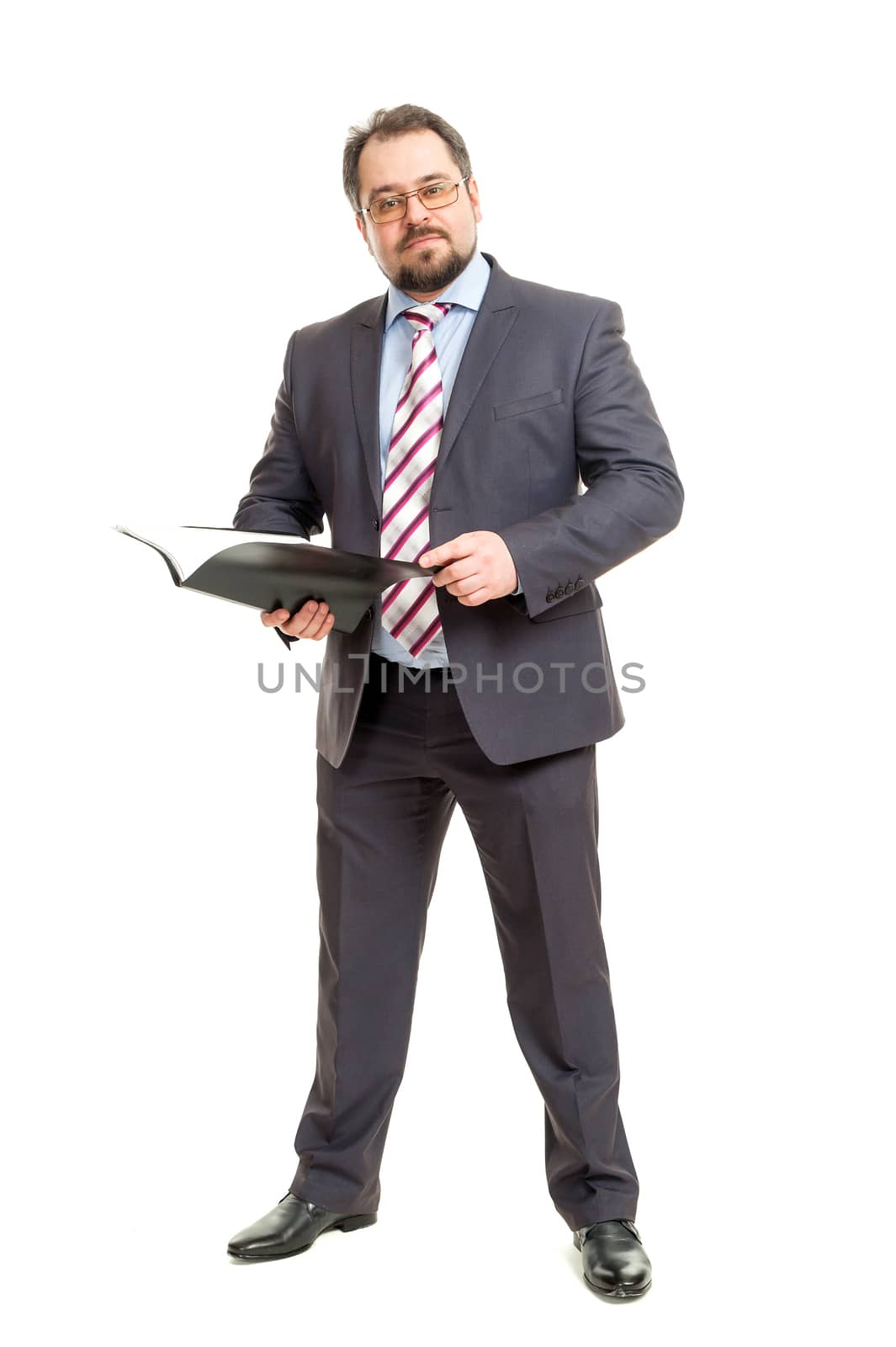 the adult man holds the folder in hand