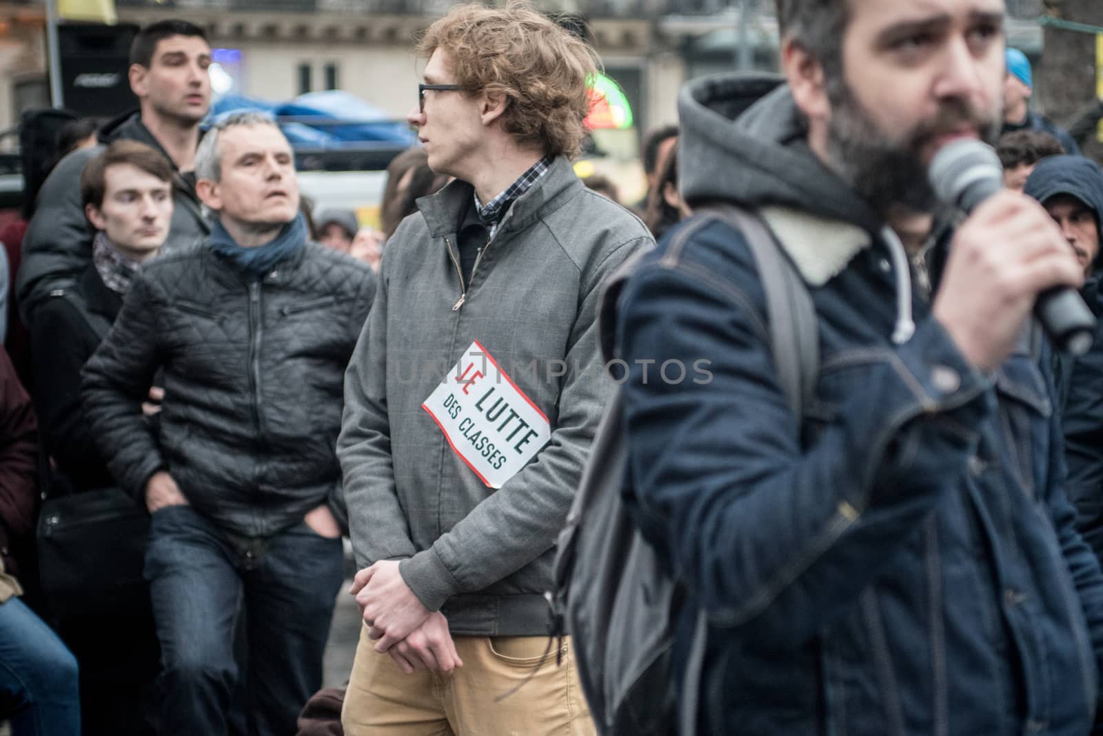FRANCE, Paris : People join the Nuit Debout or Standing night movement at the Place de la Republique in Paris on April 2, 2016. A few hundred people rallied to demand the halt of home evictions which can begin the day after the end of the French winter break, after which tenants can be evicted from their homes. They also gathered to show their opposition to the labor reform law in the wake of the nationwide demonstration which took place on March 31, 2016.