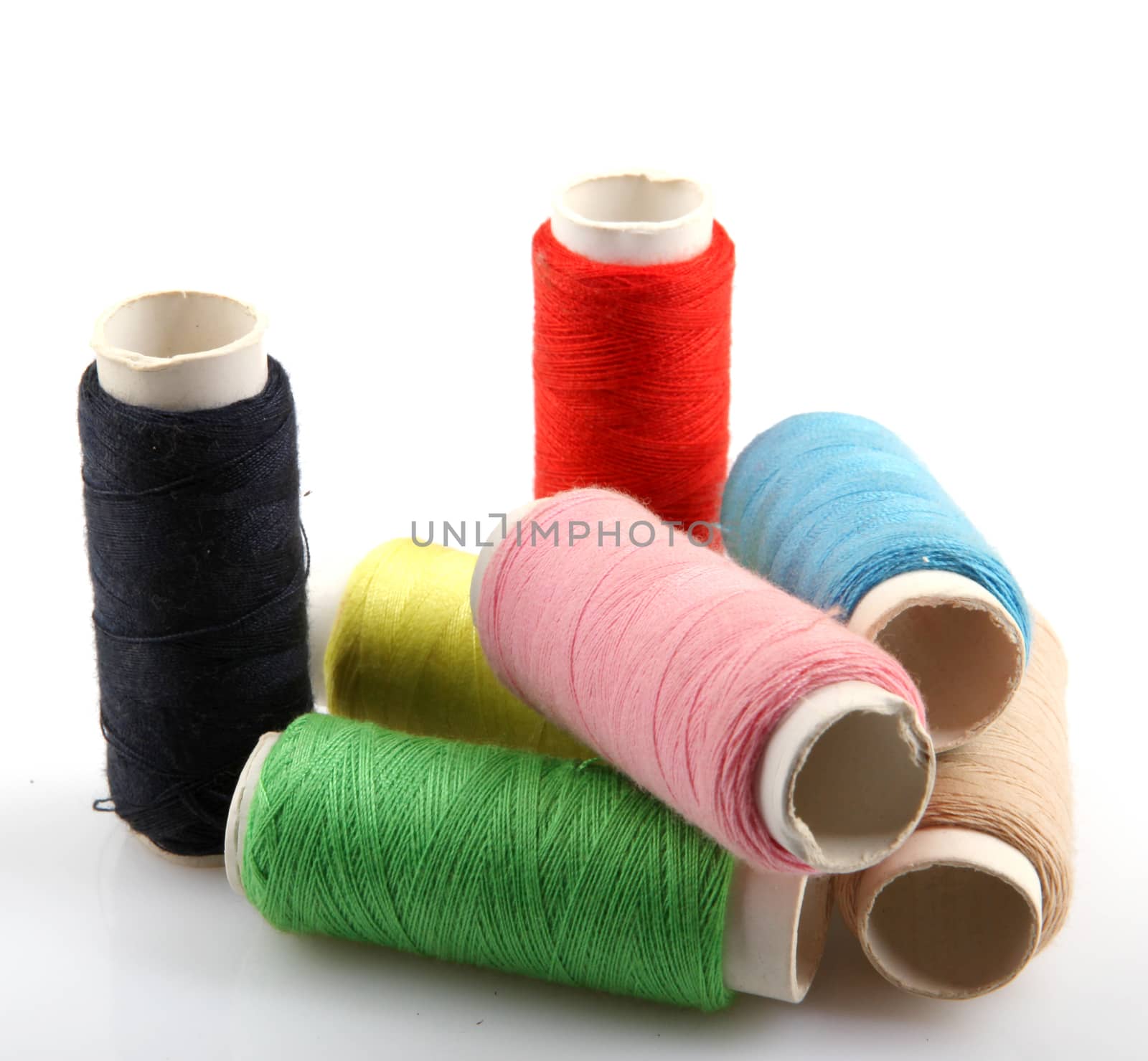 sewing threads on white background