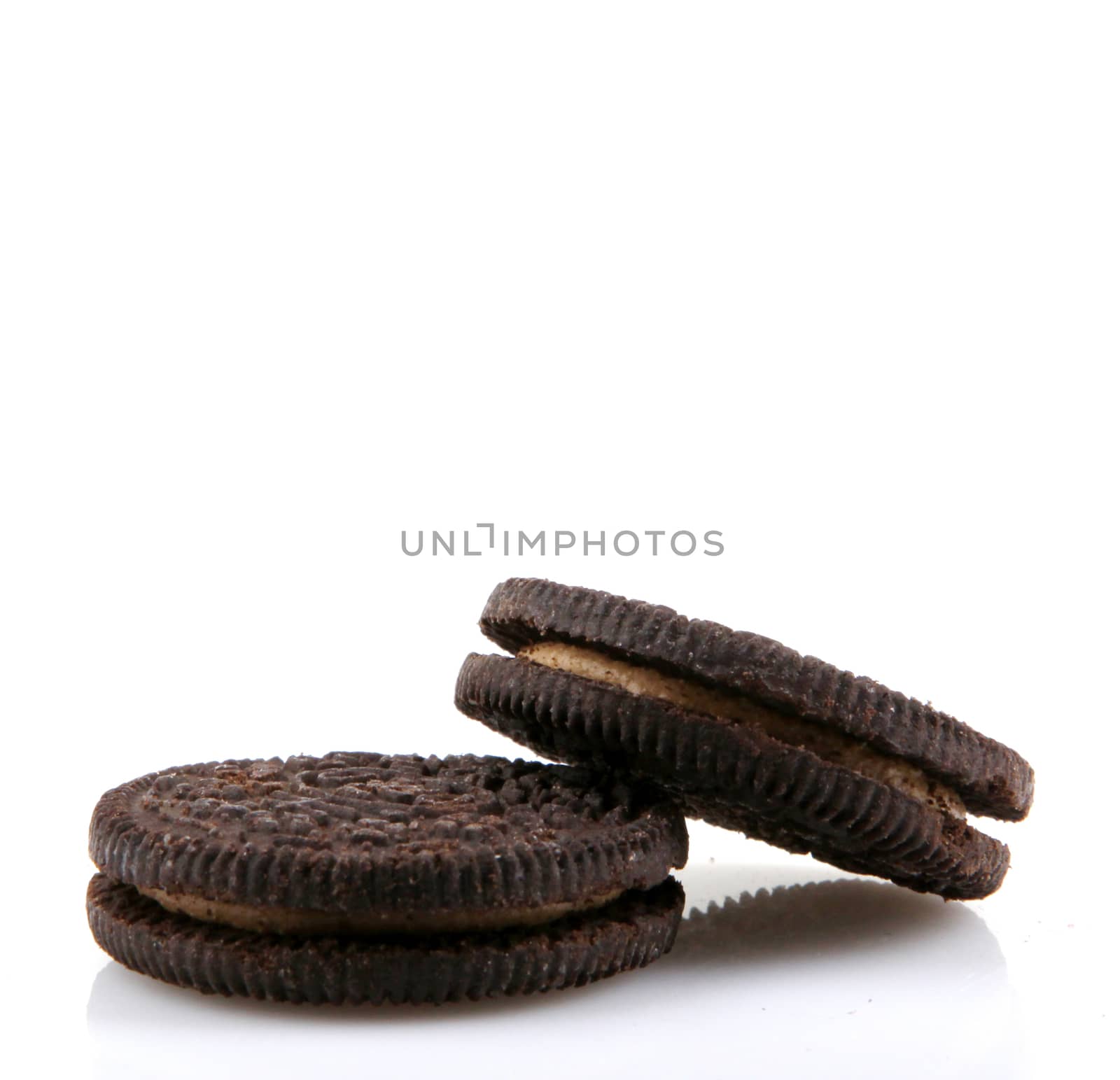 AYTOS, BULGARIA - APRIL 03, 2016: Oreo isolated on white background. Oreo is a sandwich cookie consisting of two chocolate disks with a sweet cream filling in between. by nenov