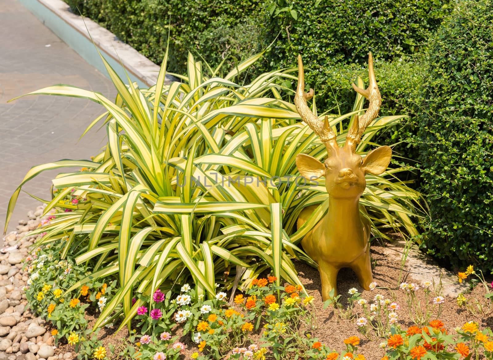 deer sculpture looking out grass by Mieszko9