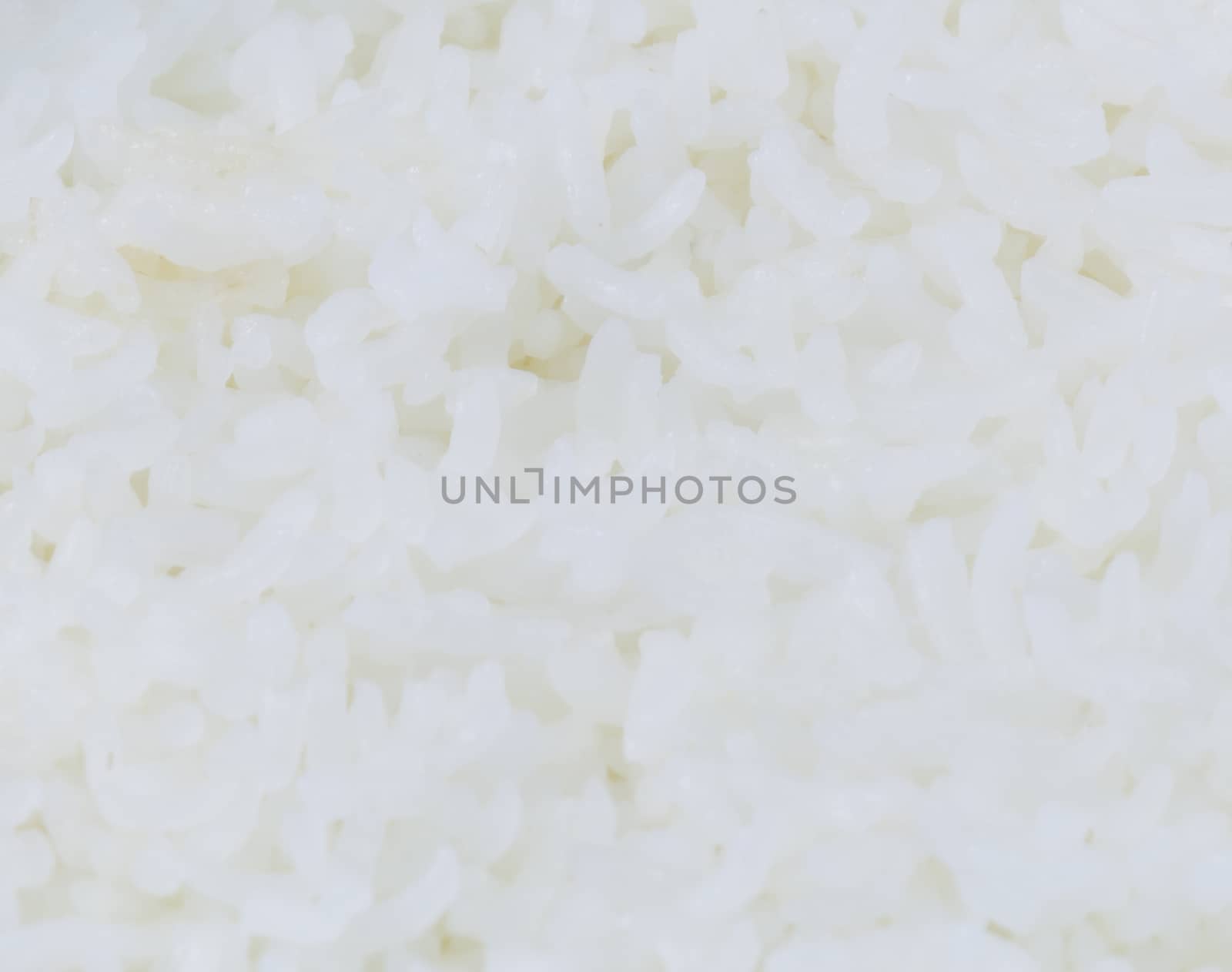 cooked white rice background texture close up by chingraph