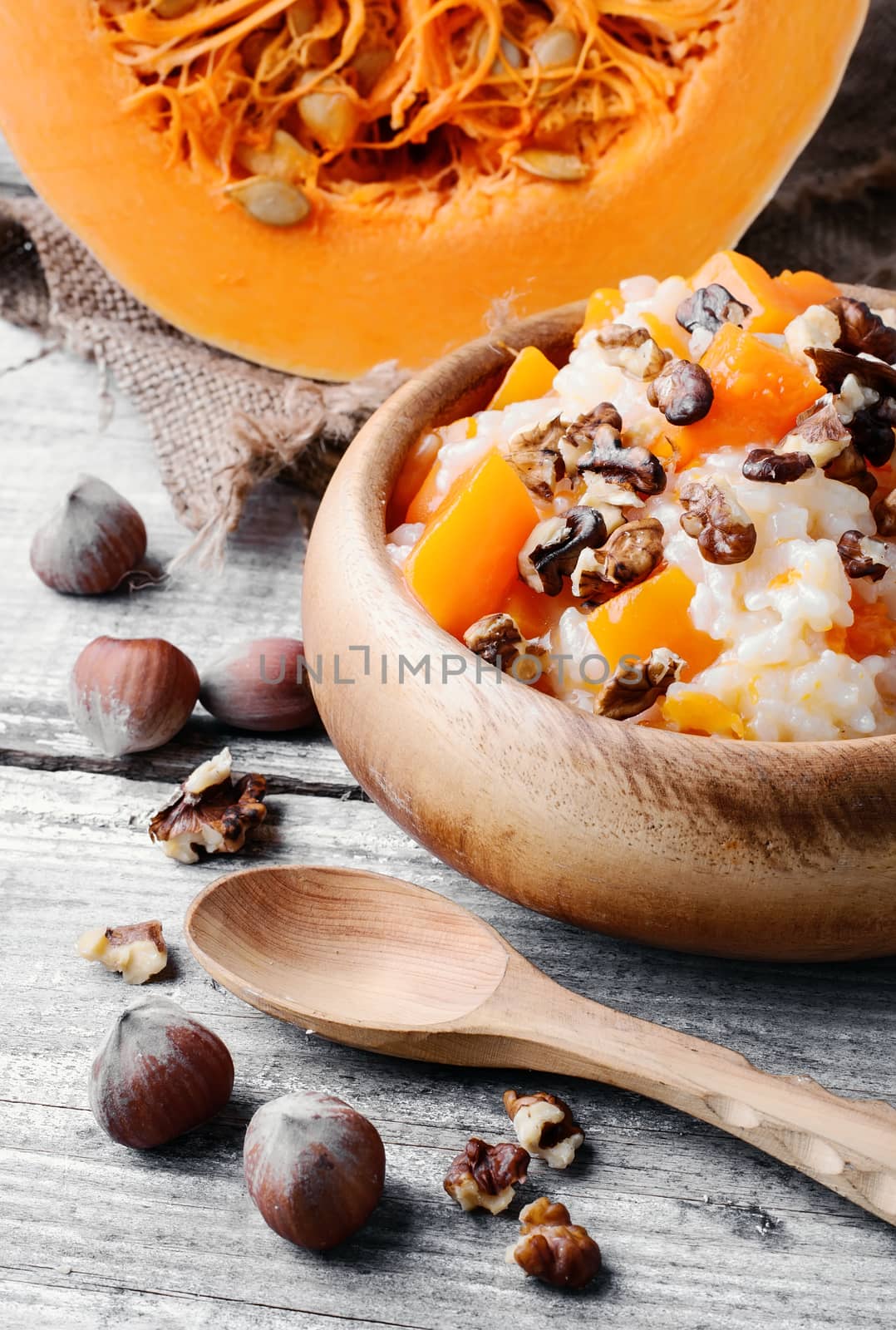 Porridge made with fresh pumpkin with the addition of nuts and hazelnuts