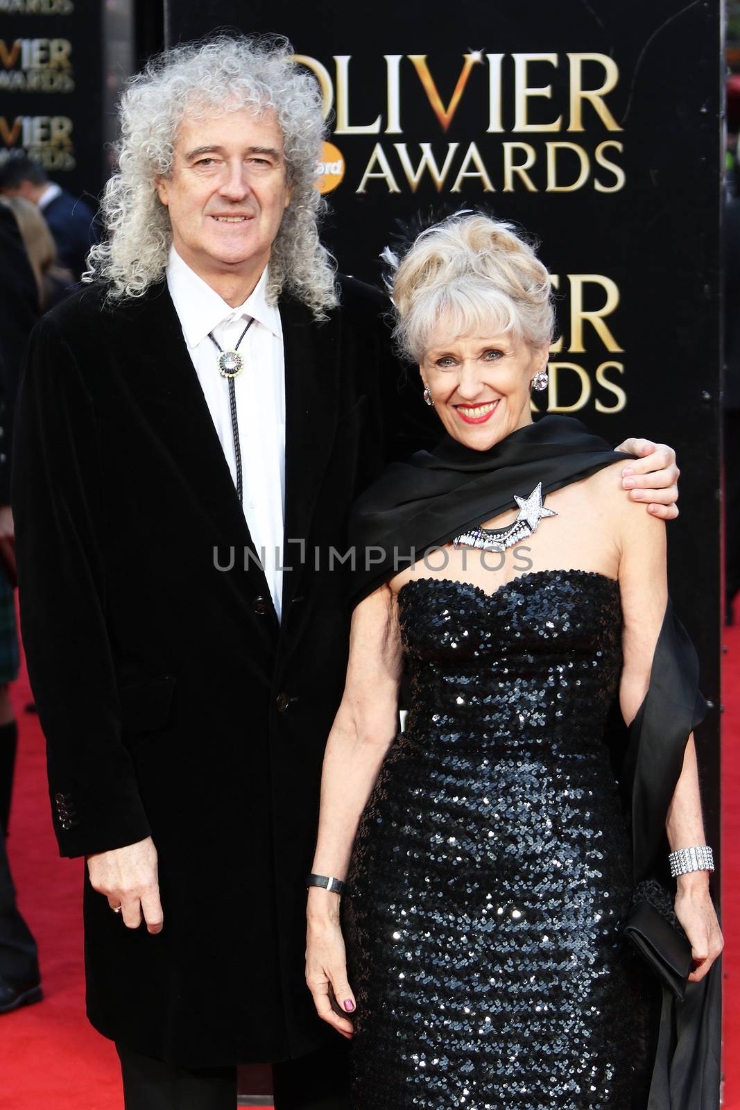 UK, London: Brian May and Anita Dobson hit the red carpet for the Olivier Awards at the Royal Opera House in London on April 3, 2016.