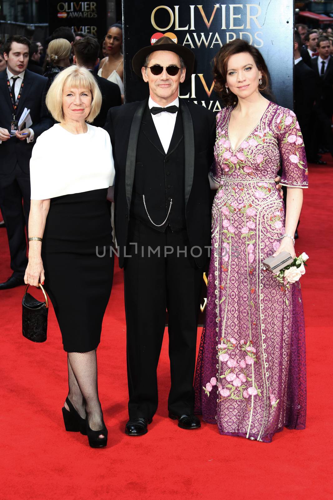 UK, London: Claire van Kampen, Mark Rylance, and Juliet Rylance hit the red carpet for the Olivier Awards at the Royal Opera House in London on April 3, 2016.