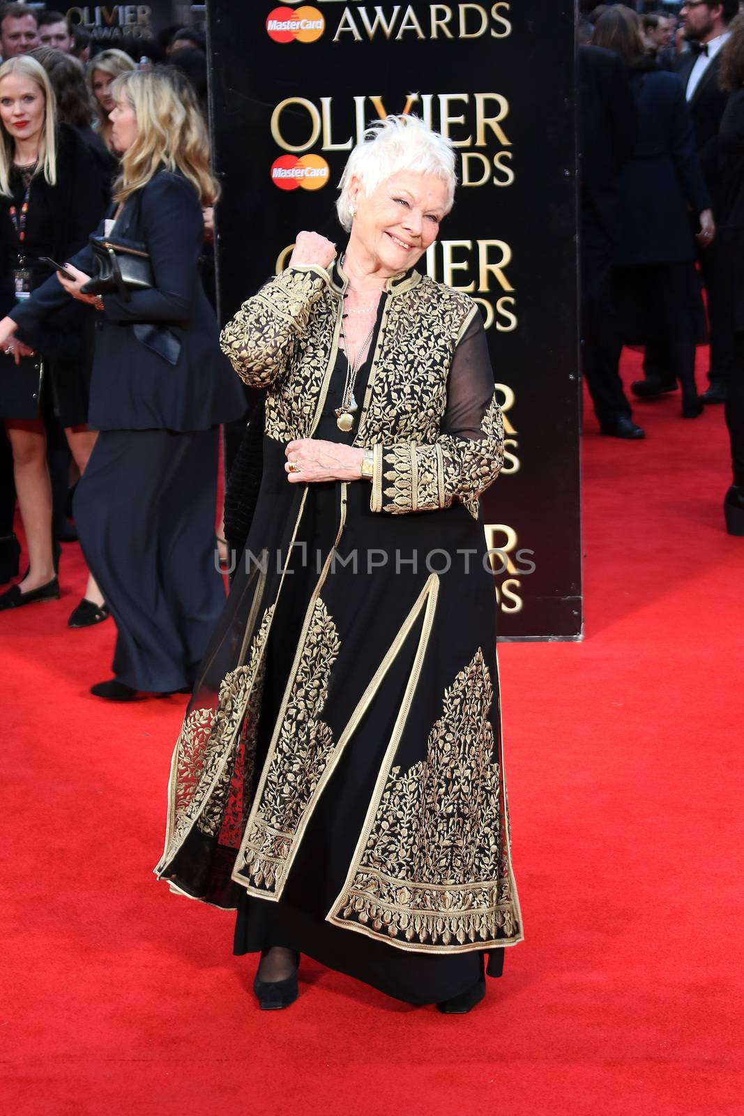 UK, London: Judi Dench hits the red carpet for the Olivier Awards at the Royal Opera House in London on April 3, 2016.