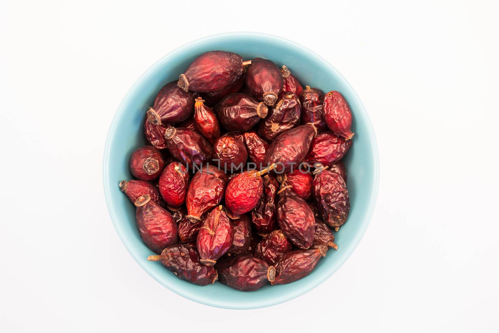 Tea herb in bowl on white background