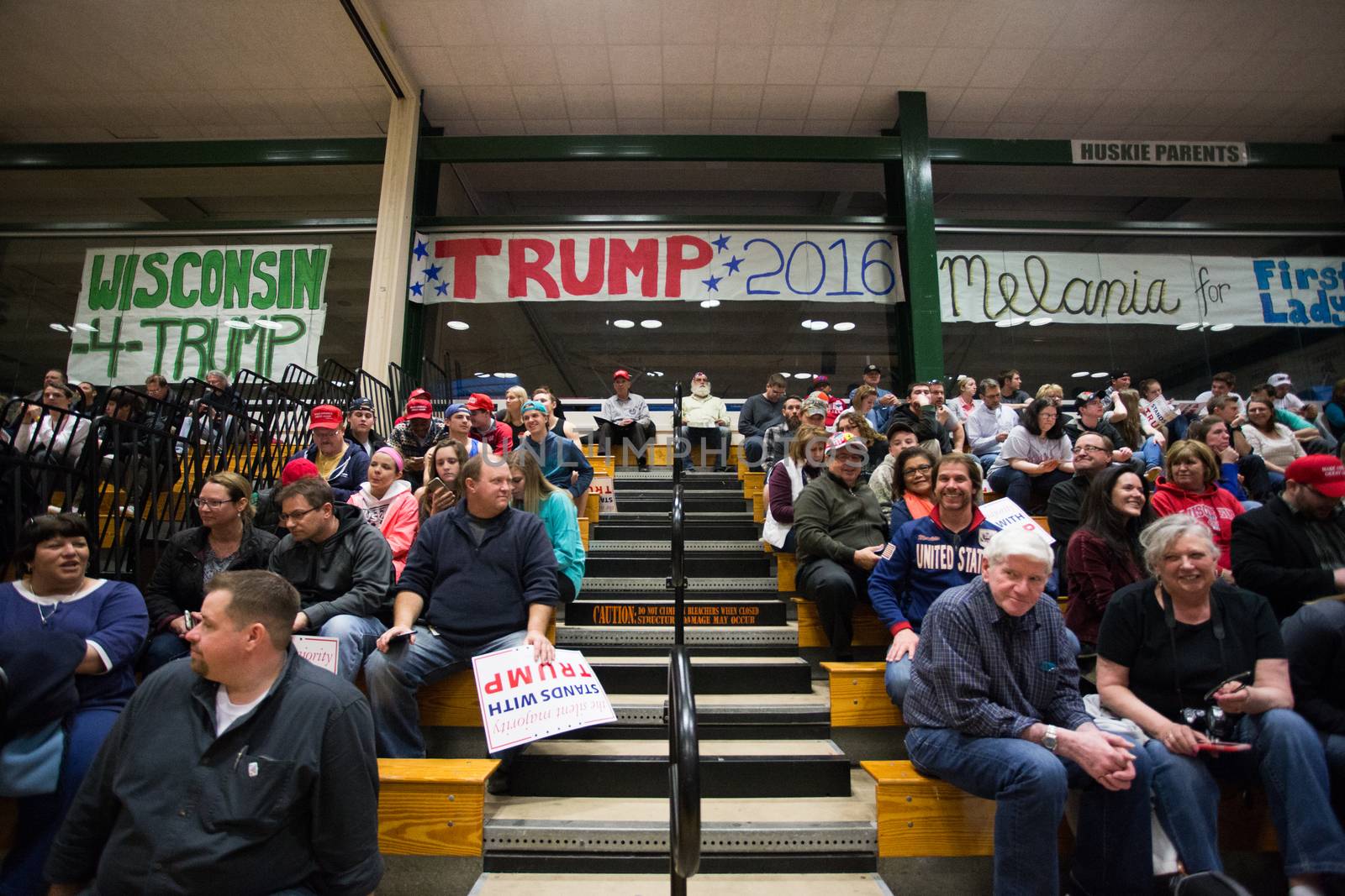 UNITED STATES, West Allis: Trump supporters wait for Republican presidential candidate Donald Trump to speak to guests during a campaign stop at Nathan Hale High School on April 2, 2016 in West Allis, Wisconsin. Wisconsin voters go to the polls for the state's primary on April 5, 2016.