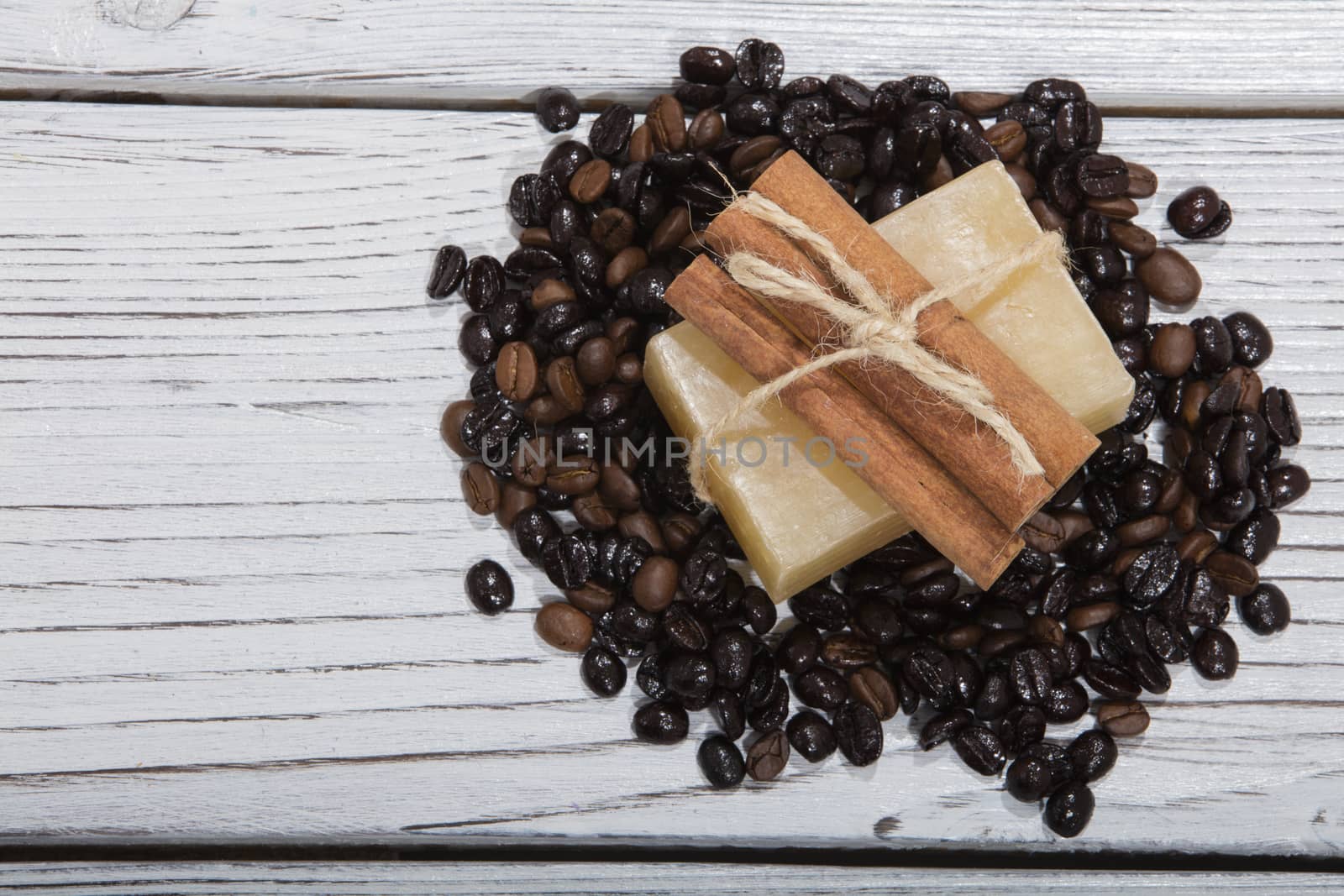 handmade soap and coffee on wooden background by senkaya