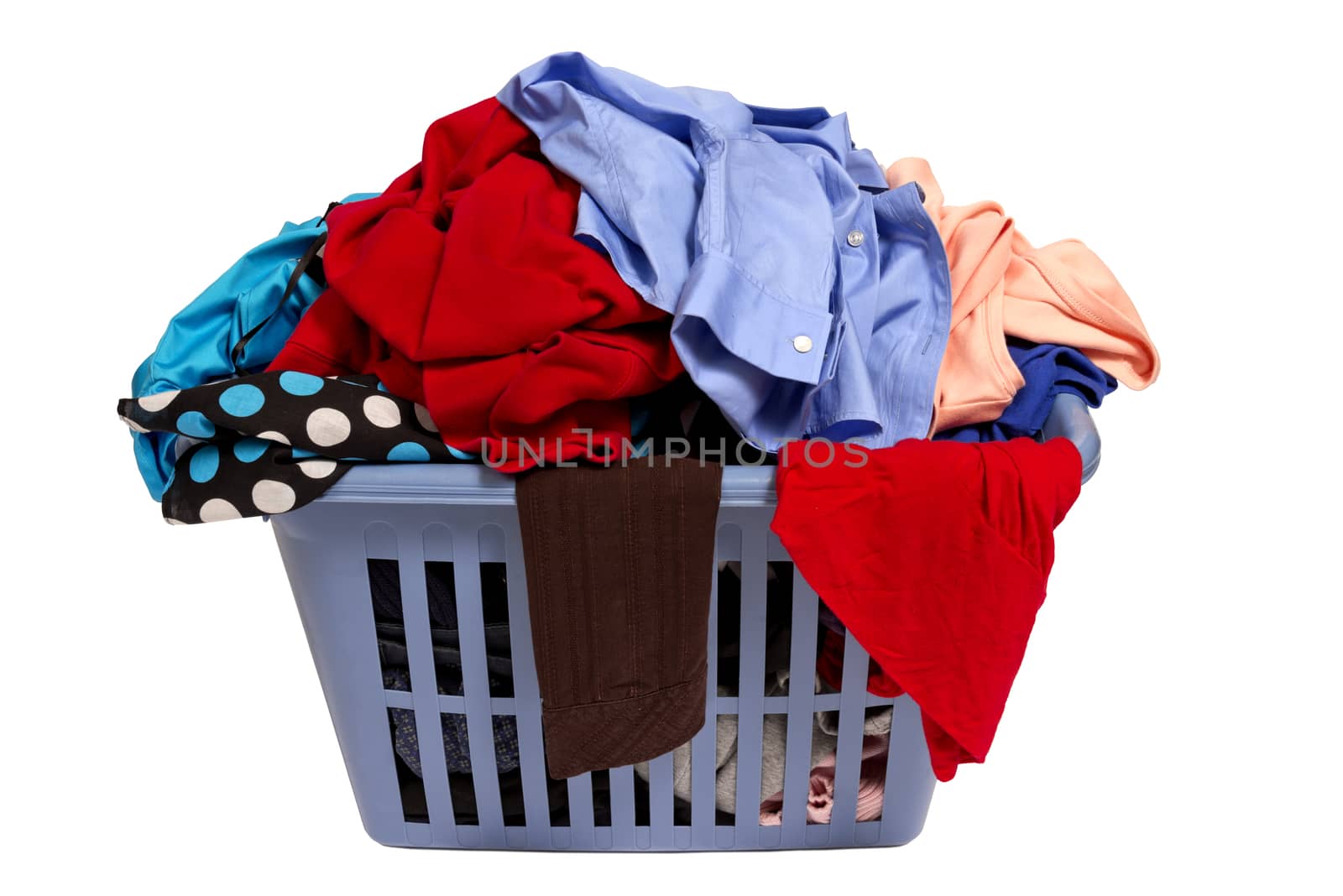 Horizontal shot of a laundry basket full of clothes.