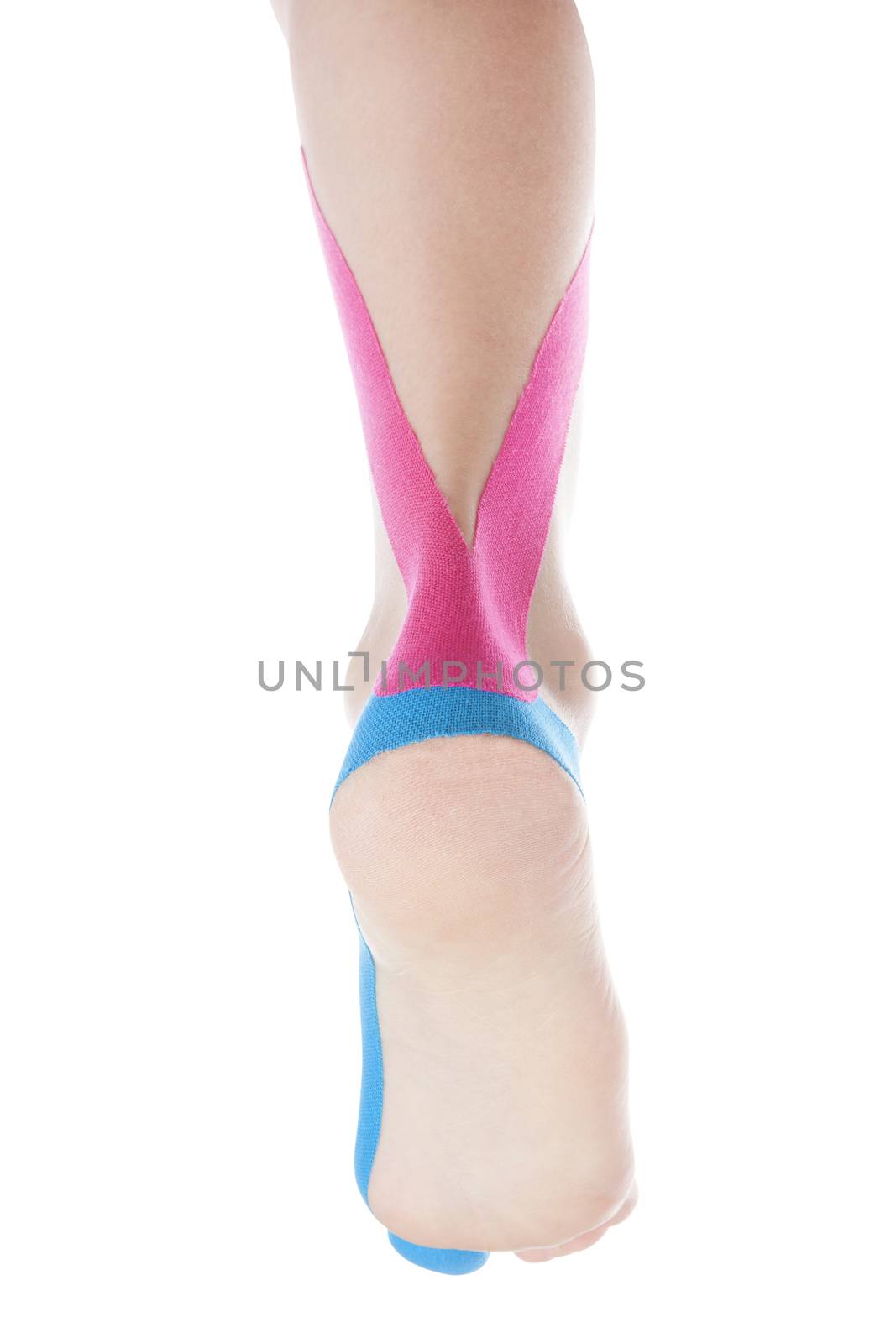 Therapeutic tape on female calf isolated on white background. Chronic pain, alternative medicine. Rehabilitation and physiotherapy. Calf pain.