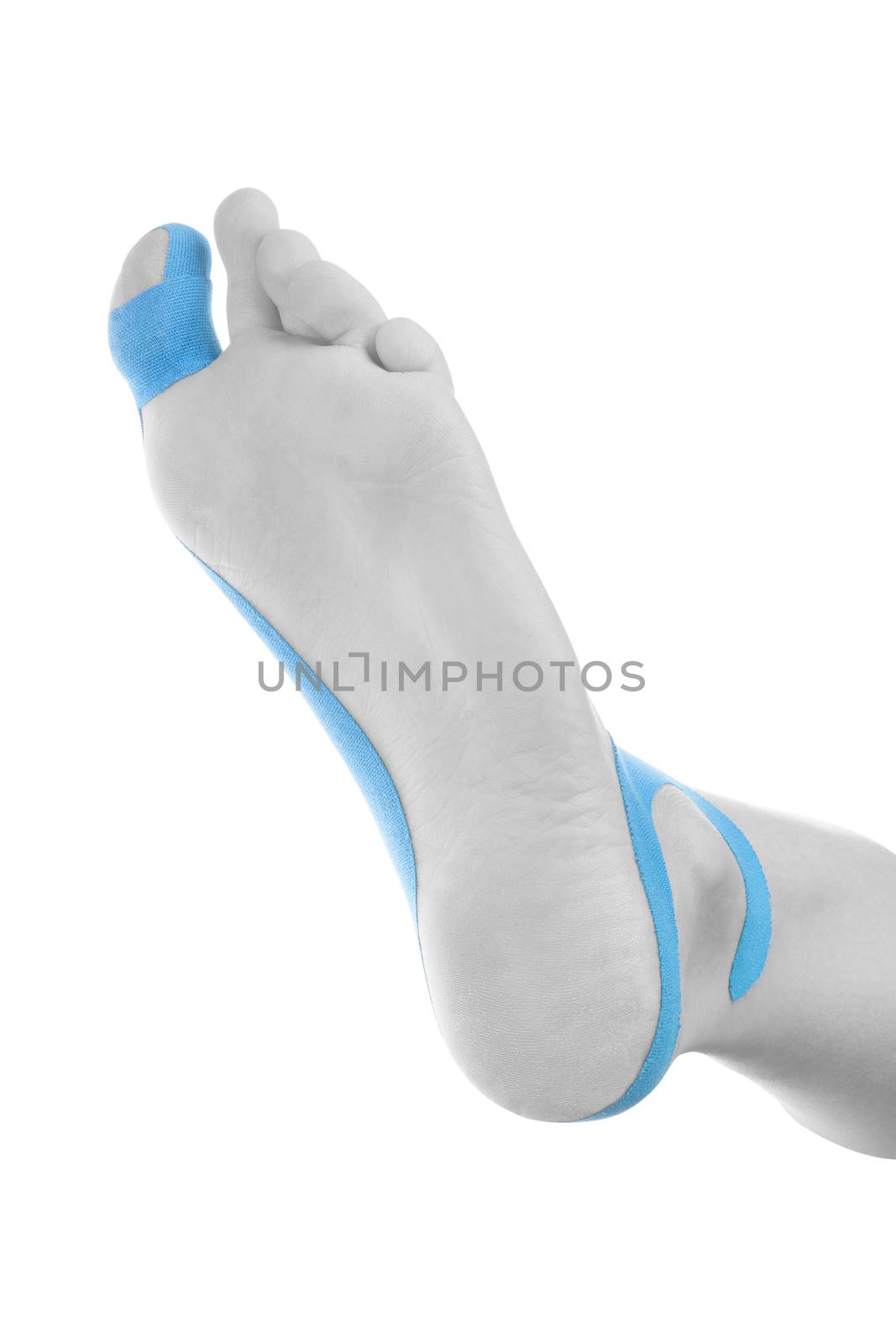 Therapeutic tape on female foot isolated on white background. Chronic pain, alternative medicine. Rehabilitation and physiotherapy.