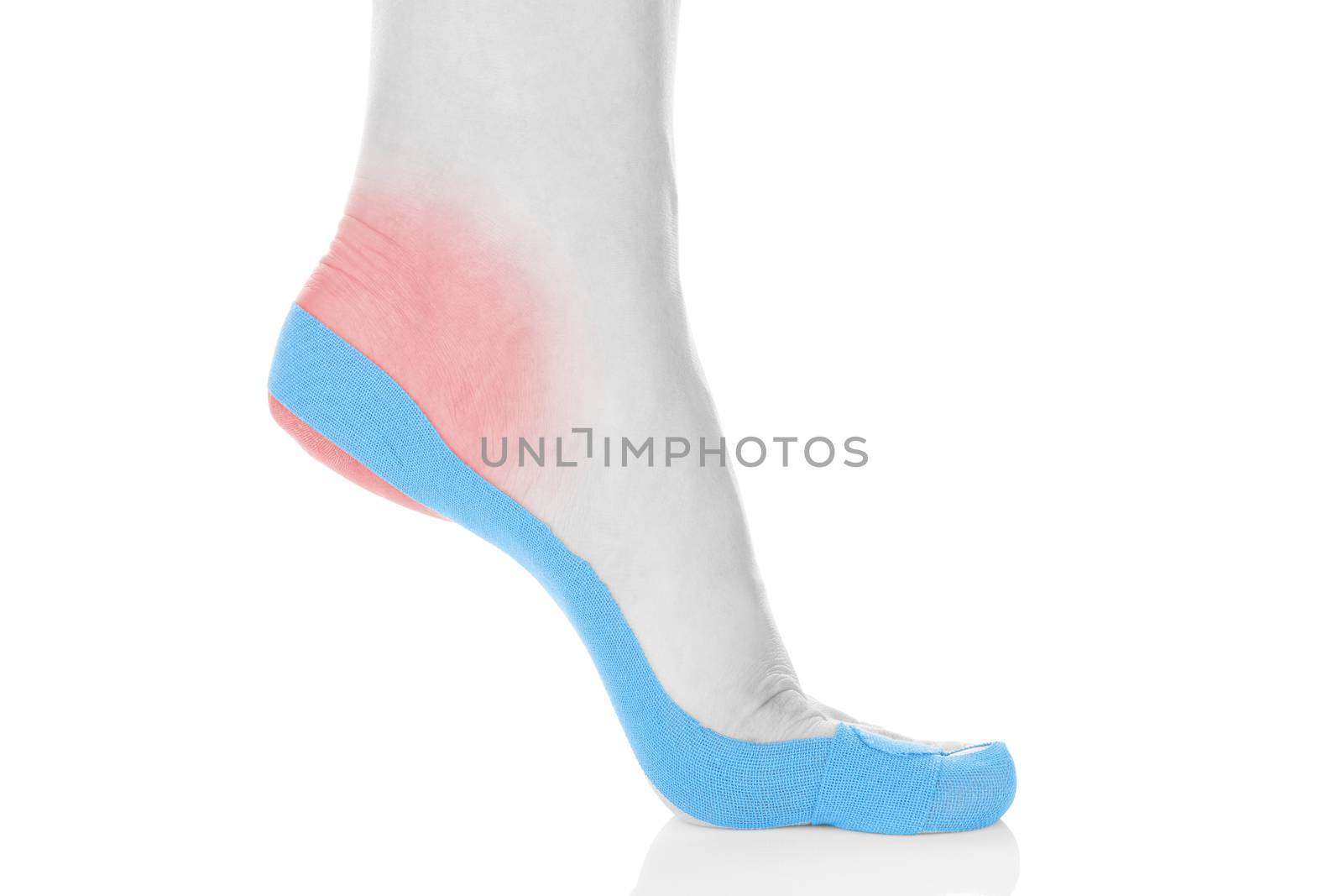 Therapeutic tape on female foot isolated on white background. Chronic pain, alternative medicine. Rehabilitation and physiotherapy.