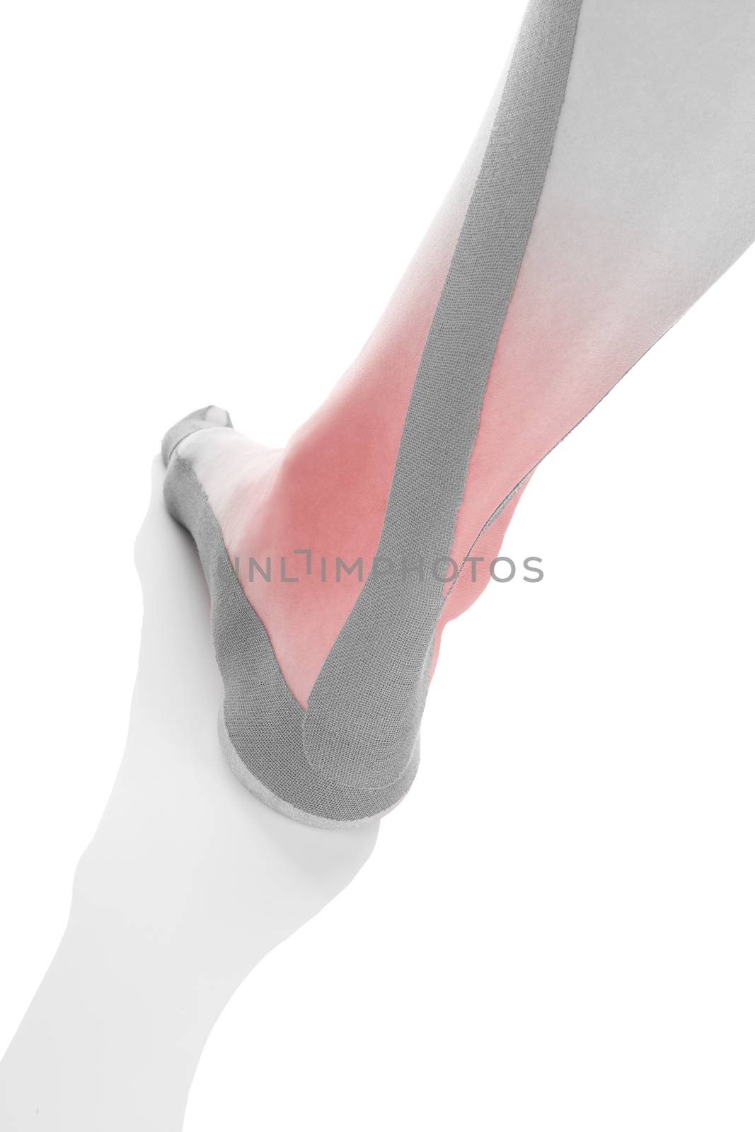Therapeutic tape on female heel isolated on white background. Chronic pain, alternative medicine. Rehabilitation and physiotherapy.